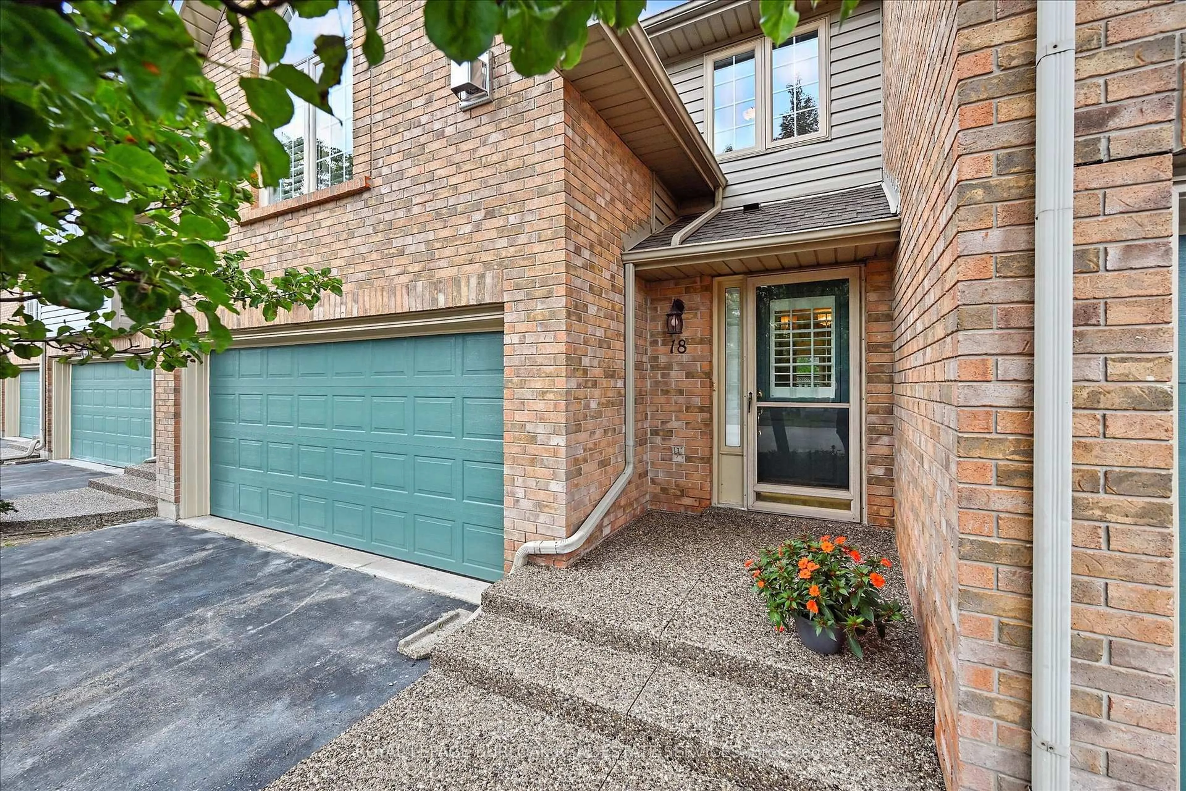 Home with brick exterior material, street for 3333 New St #18, Burlington Ontario L7N 1N1