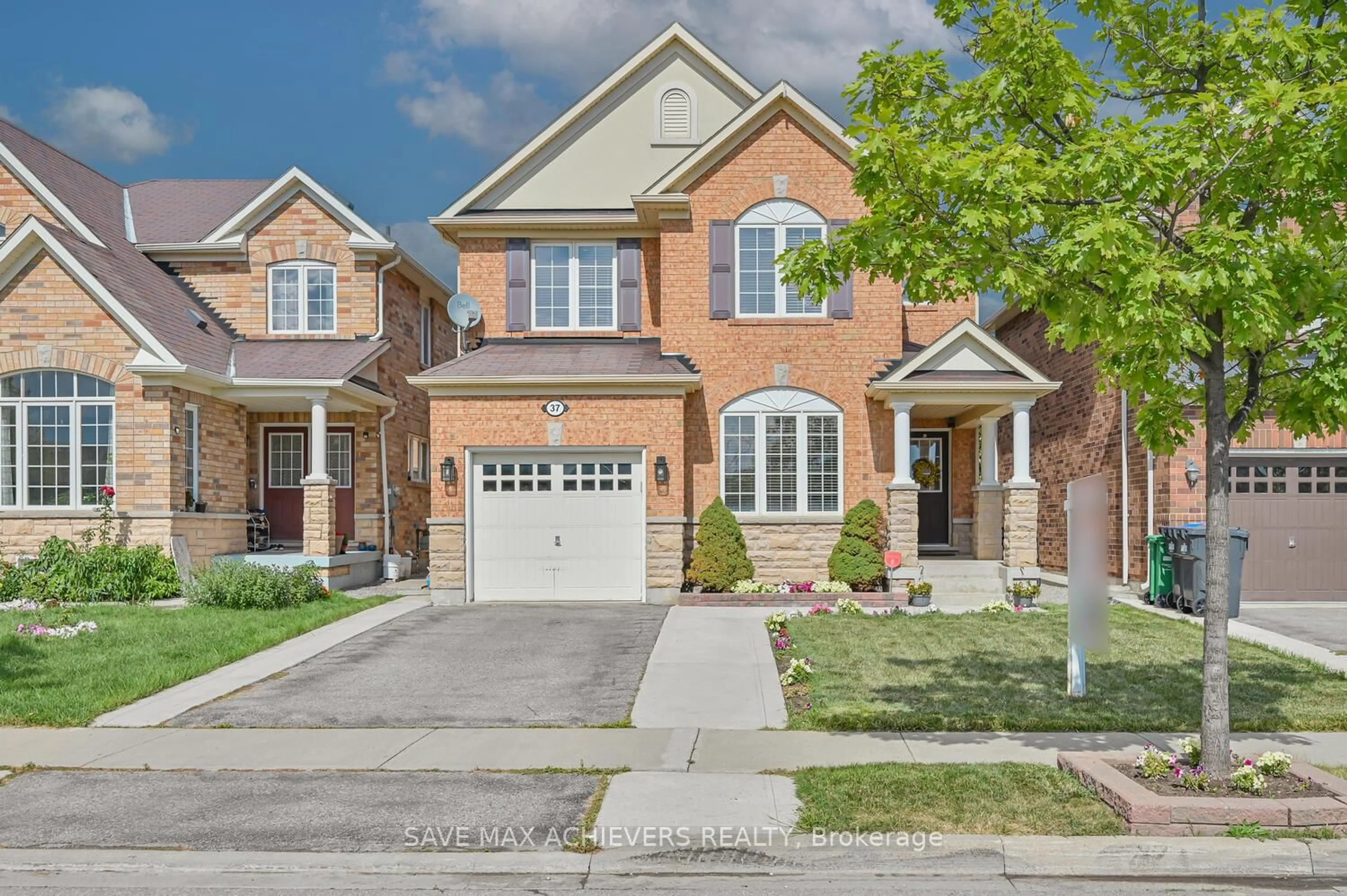 Home with brick exterior material, street for 37 BLOOM Dr, Brampton Ontario L6P 3C3