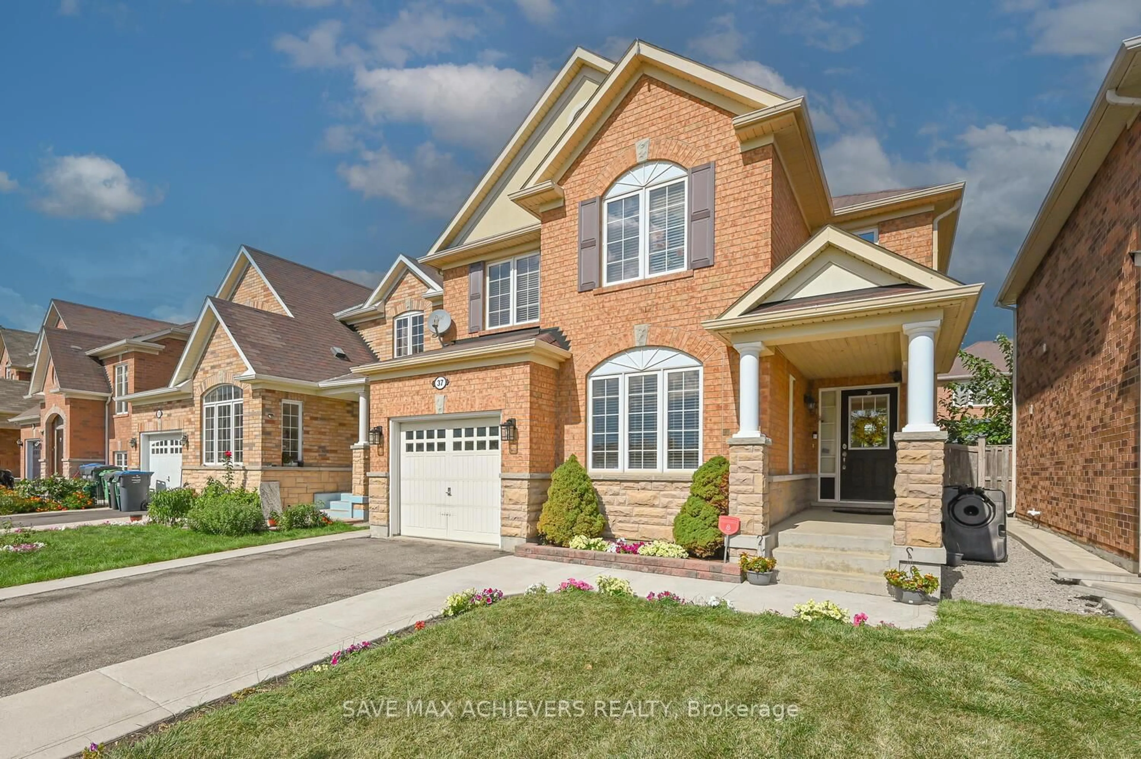 Home with brick exterior material, street for 37 BLOOM Dr, Brampton Ontario L6P 3C3