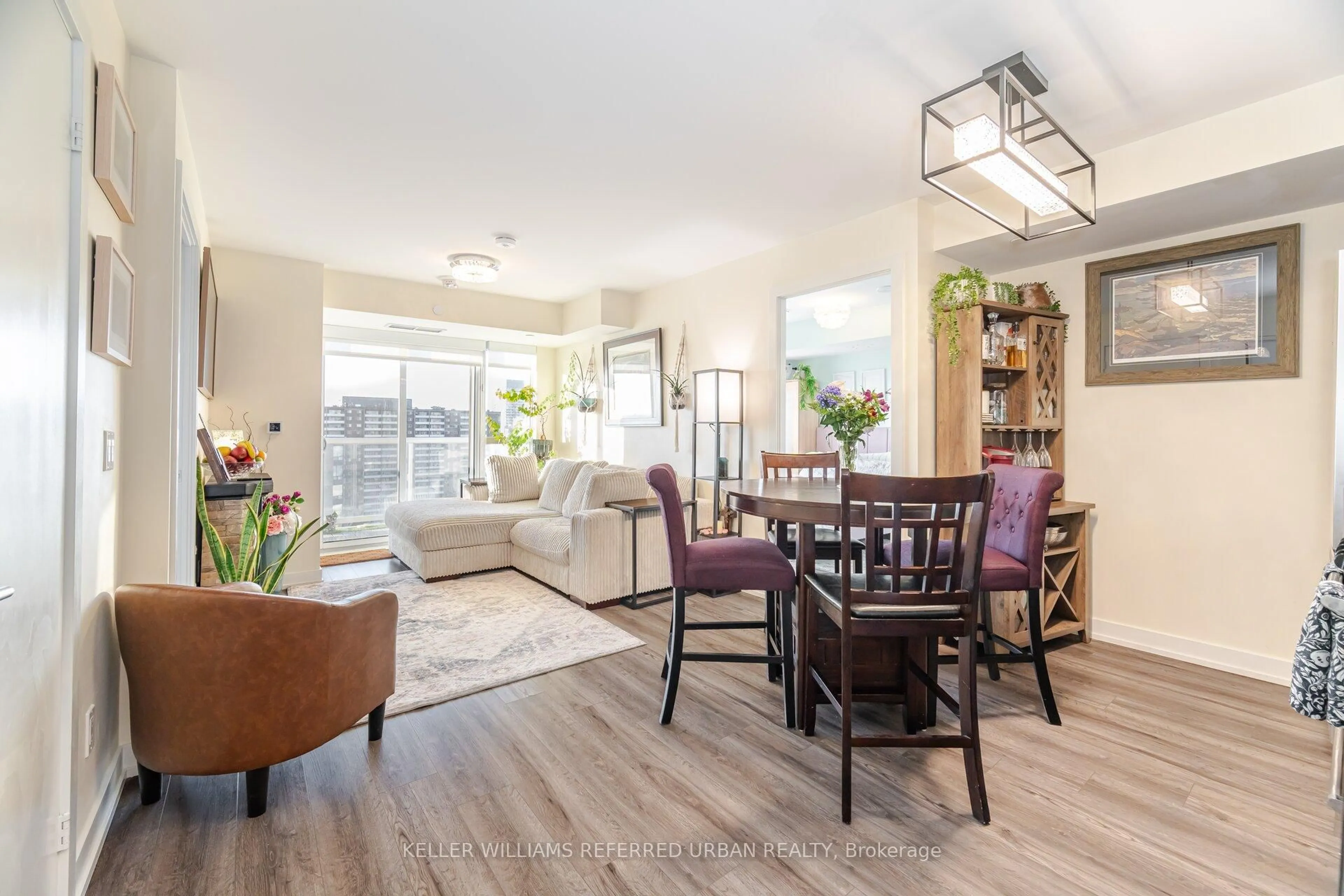 Living room with furniture, wood/laminate floor for 10 Wilby Cres #1807, Toronto Ontario M9N 0B6