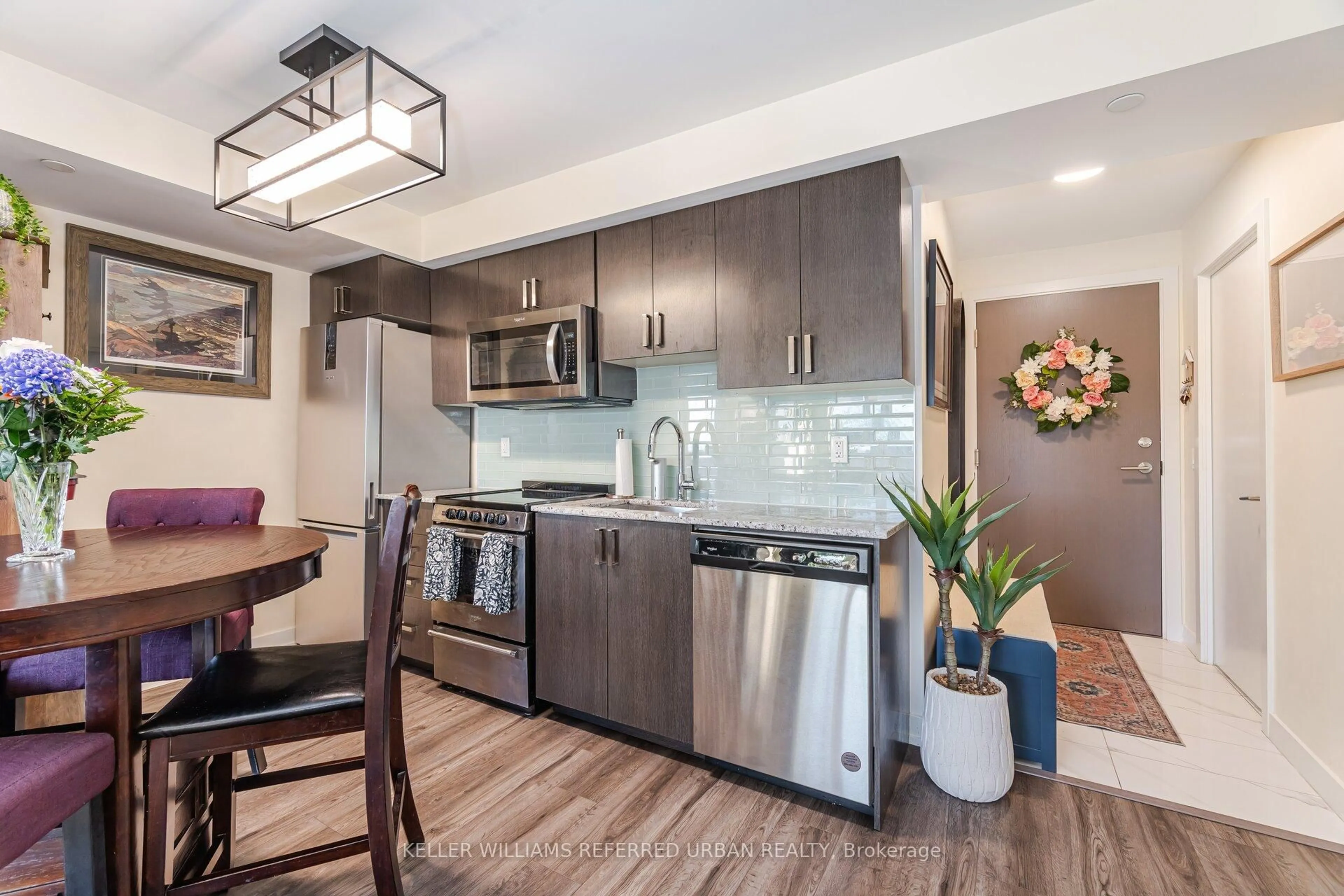 Open concept kitchen, wood/laminate floor for 10 Wilby Cres #1807, Toronto Ontario M9N 0B6