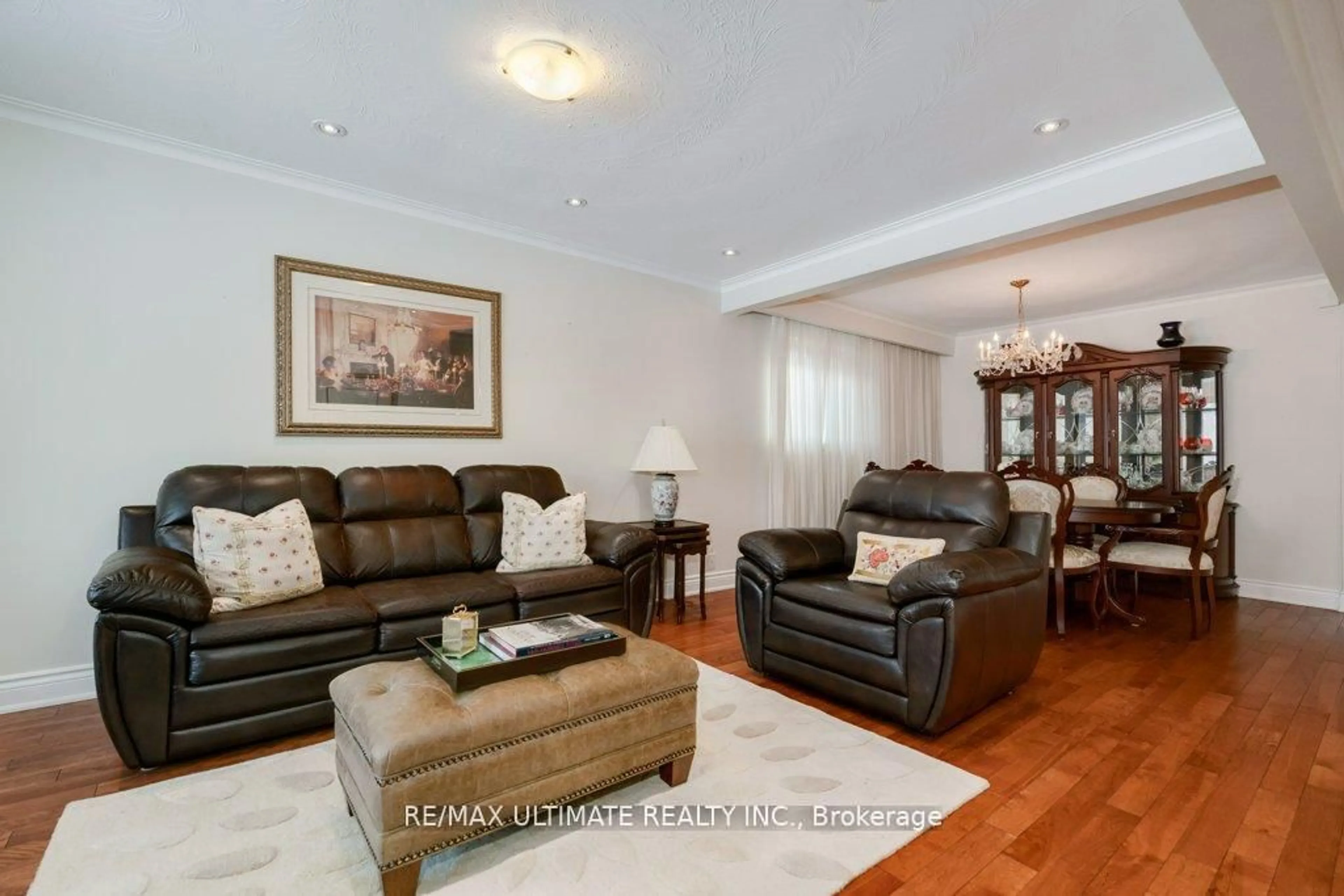 Living room with furniture, wood/laminate floor for 68 Caledonia Rd, Toronto Ontario M6E 4S6