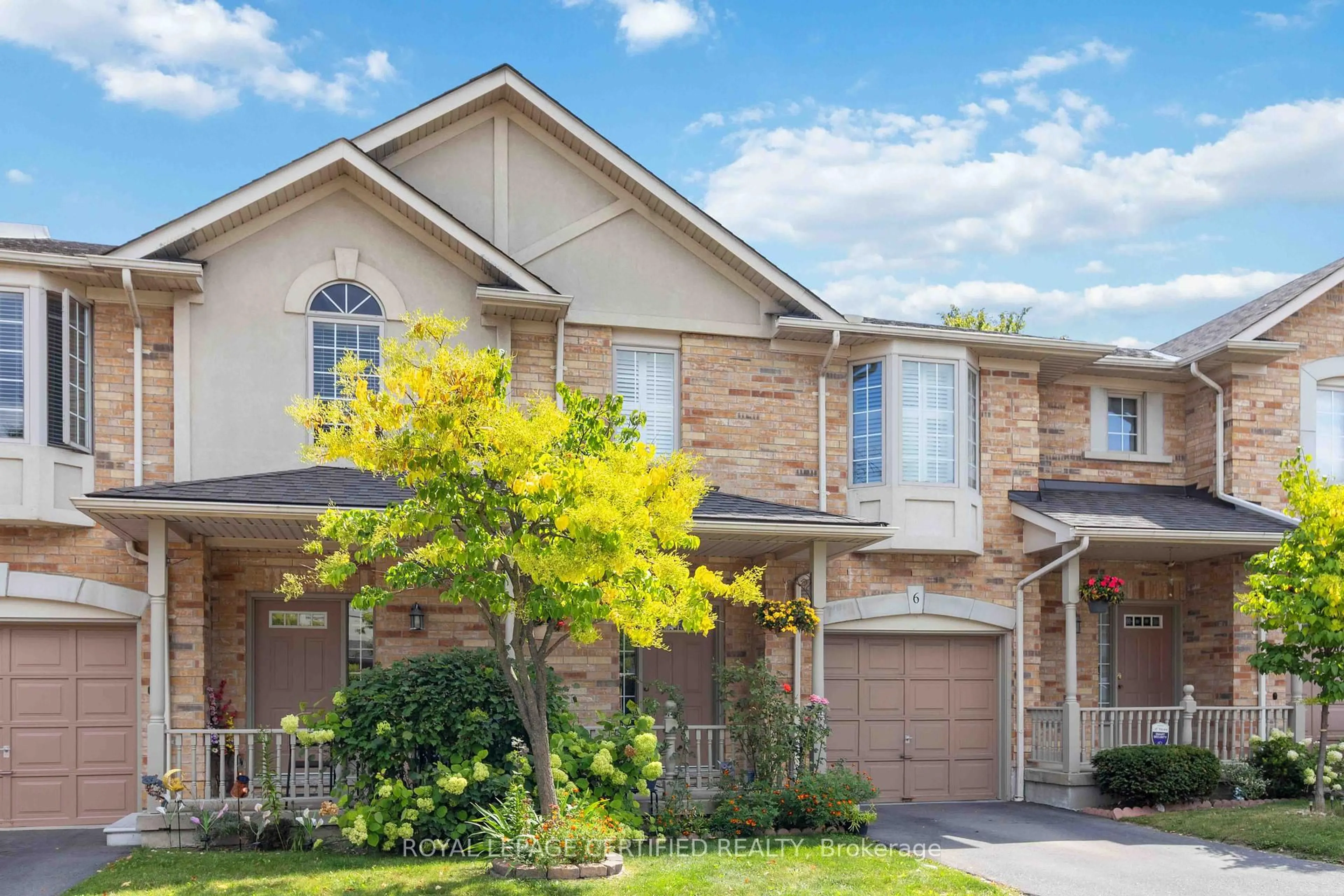 Home with brick exterior material, street for 7385 Magistrate Terr #6, Mississauga Ontario L5W 1W8