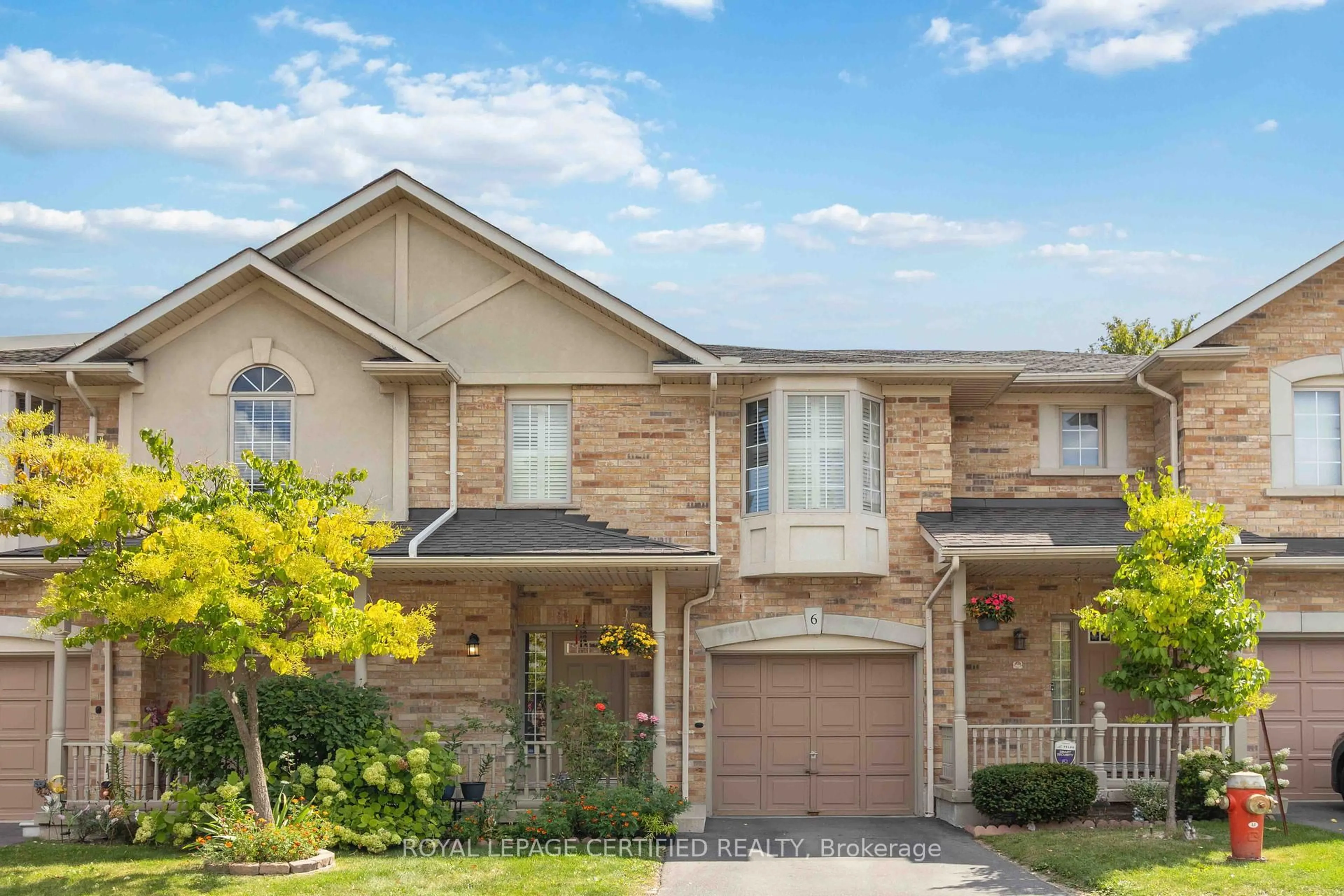 Home with brick exterior material, street for 7385 Magistrate Terr #6, Mississauga Ontario L5W 1W8