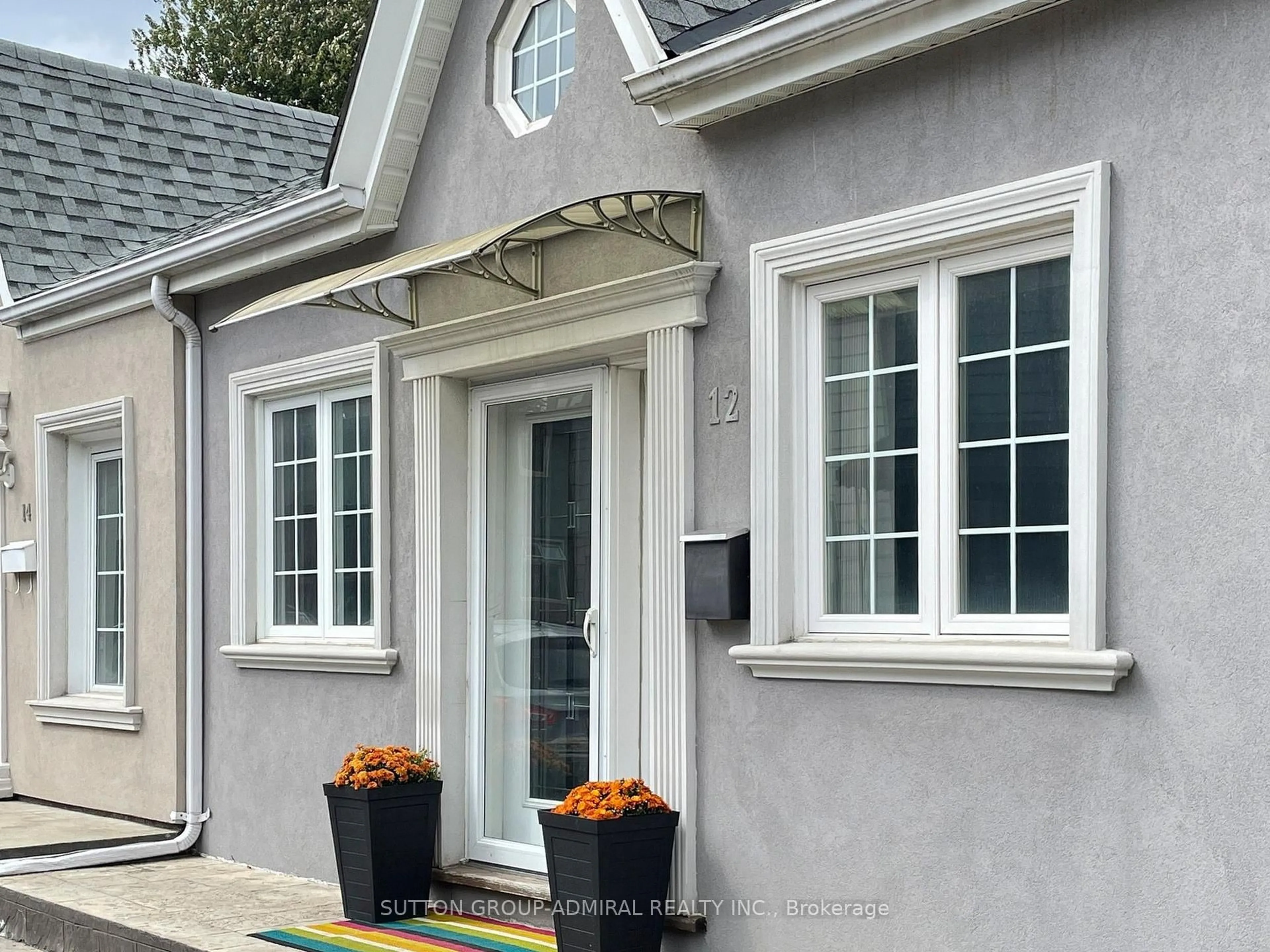 Home with vinyl exterior material, street for 12 Abbs St, Toronto Ontario M6K 1M6