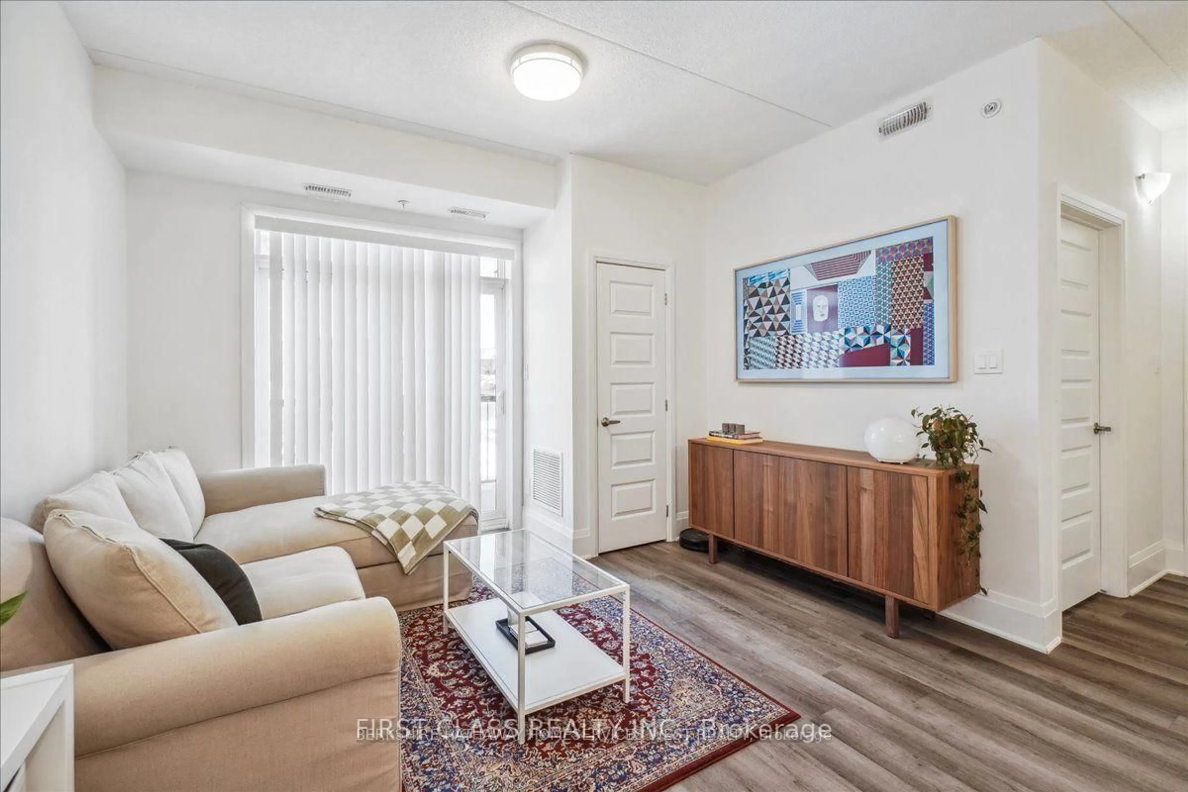 Living room with furniture, unknown for 610 Farmstead Dr #104, Milton Ontario L9T 8X5