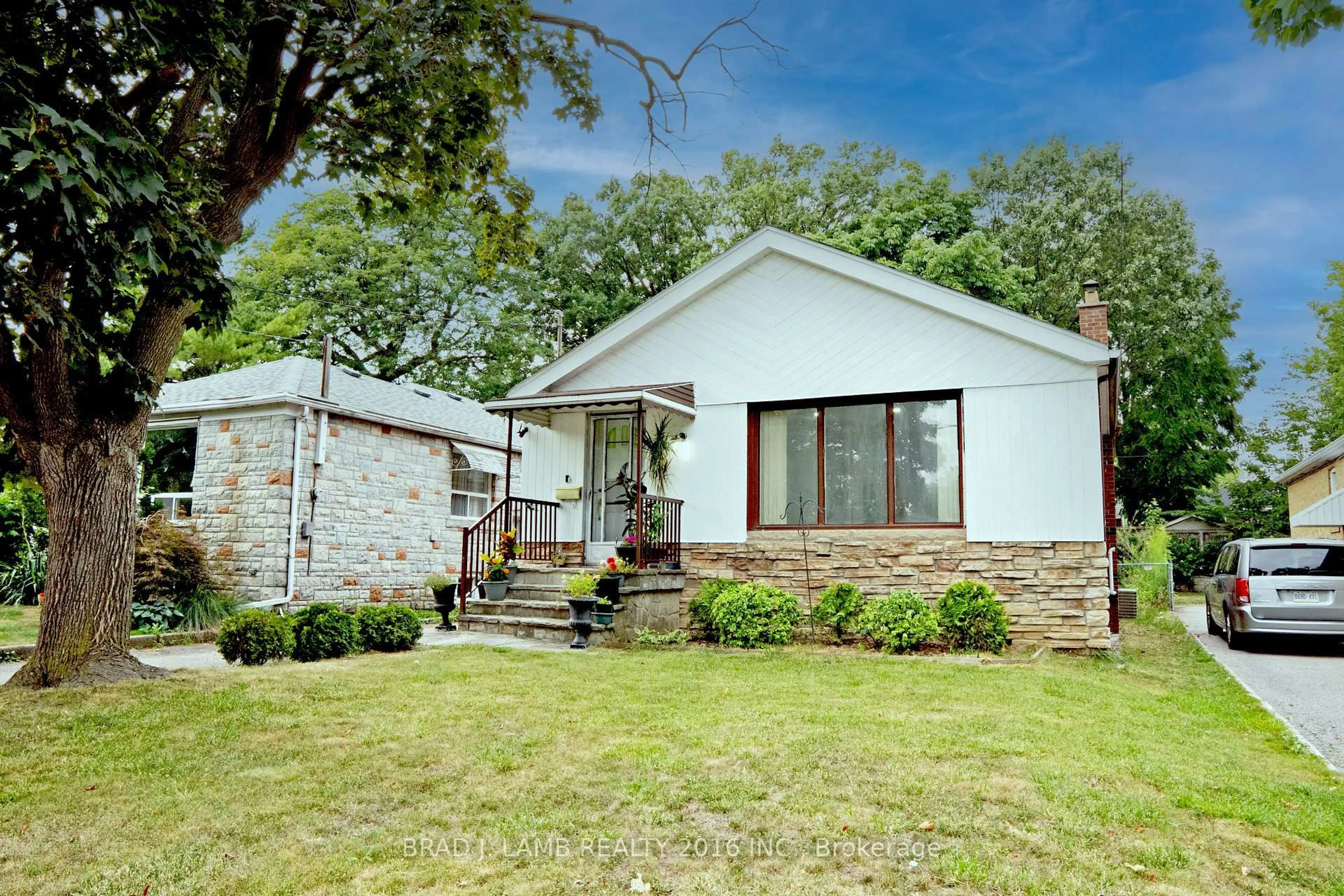 Home with brick exterior material, street for 42 Lynnford Dr, Toronto Ontario M9B 1H7