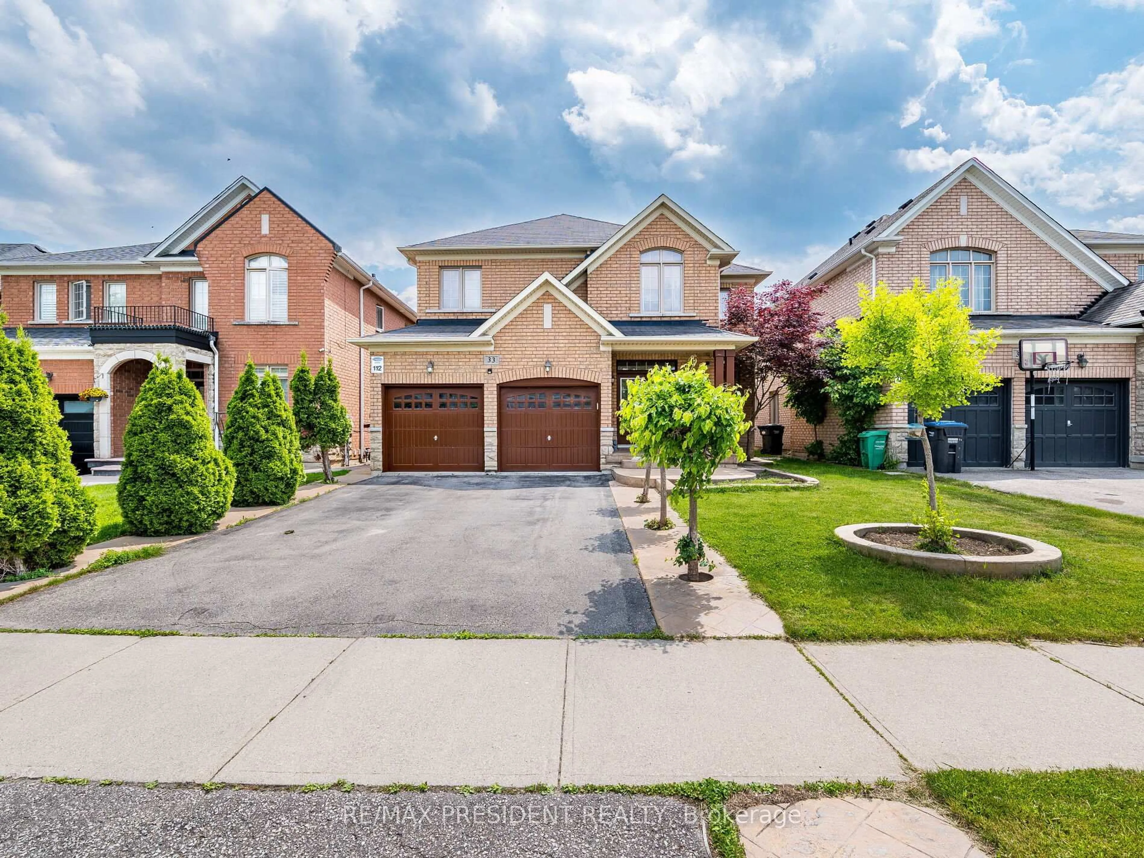 Home with brick exterior material, street for 33 Belleville Dr, Brampton Ontario L6P 1V8