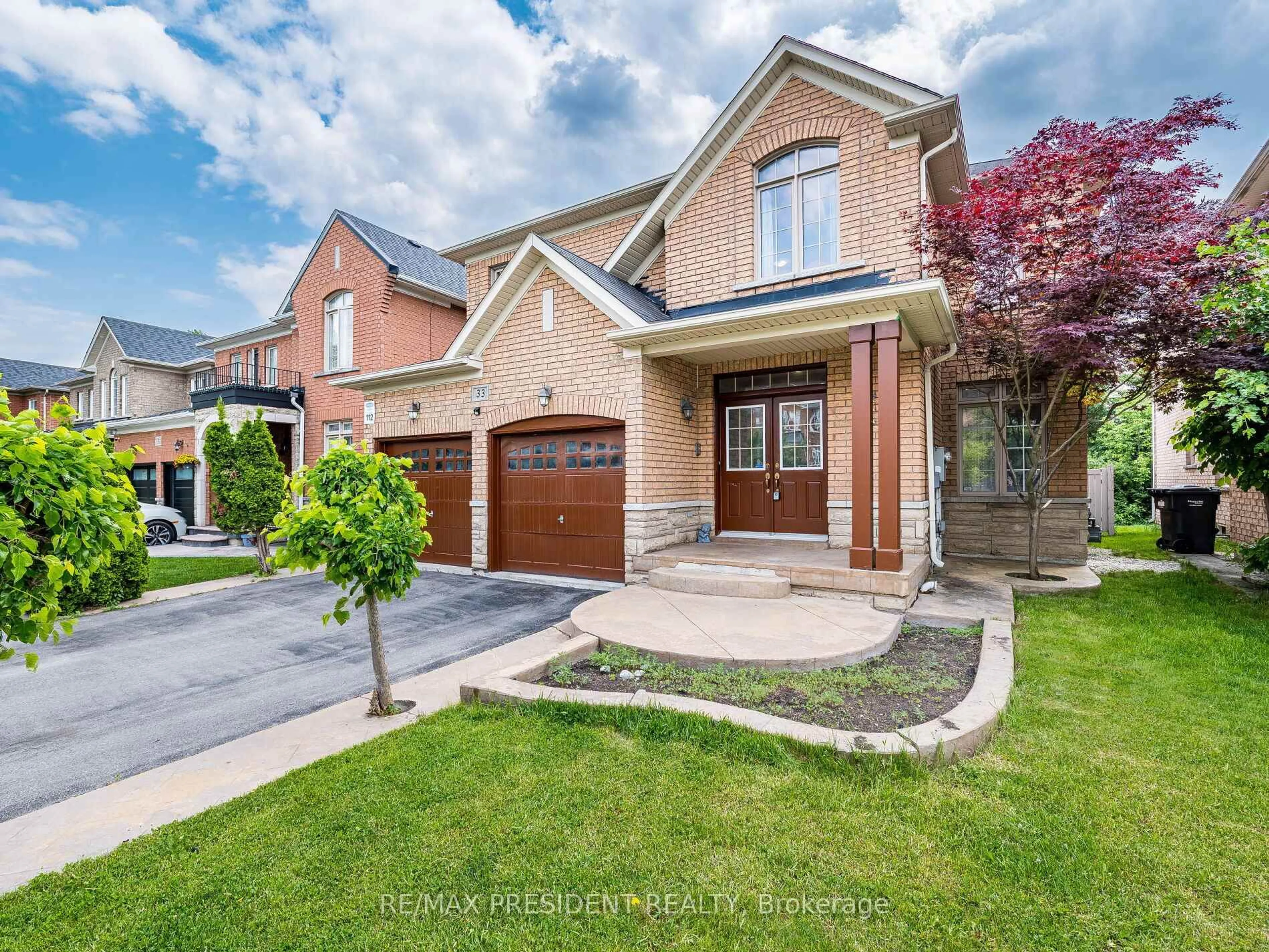 Home with brick exterior material, street for 33 Belleville Dr, Brampton Ontario L6P 1V8