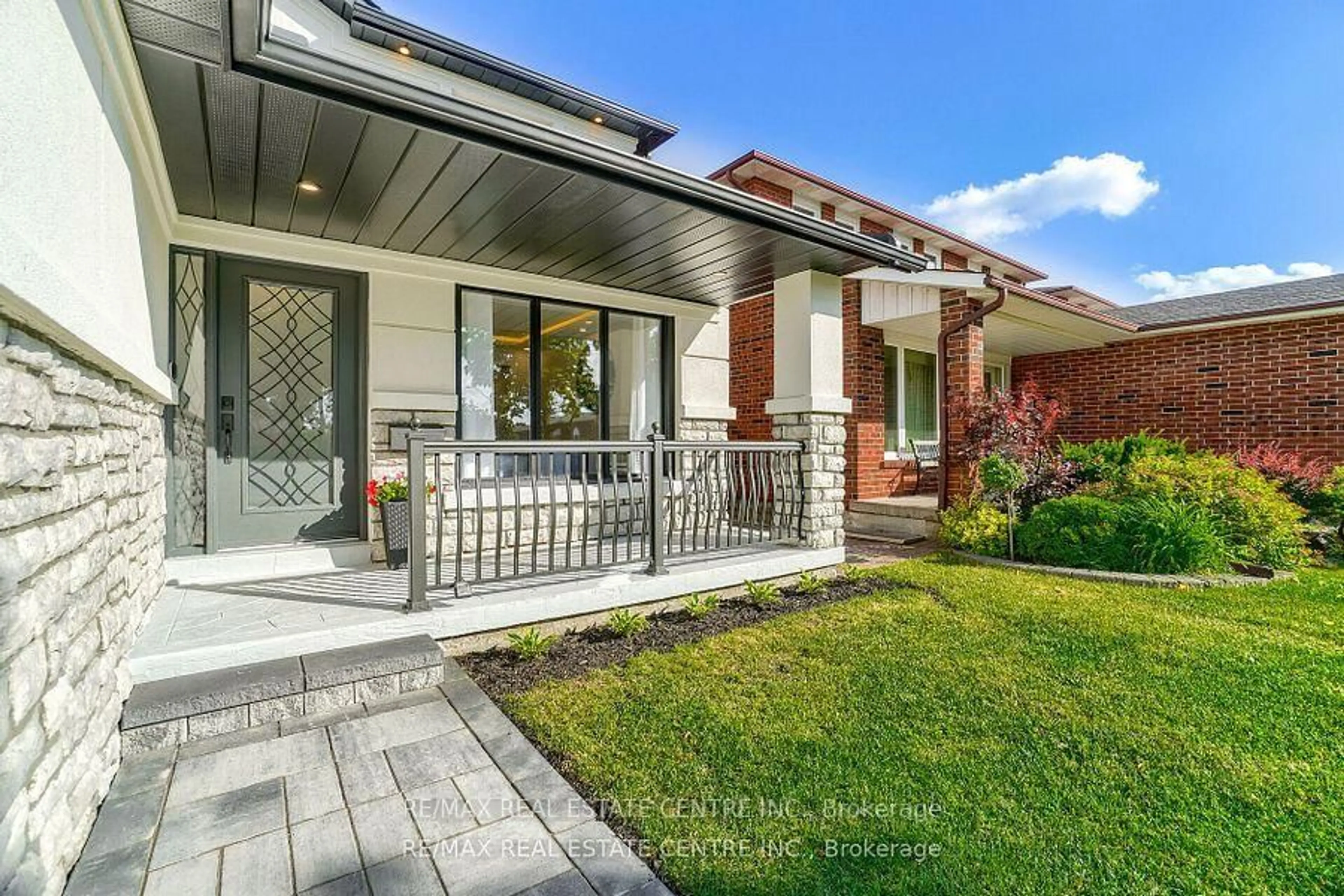 Home with brick exterior material, street for 550 Meadows Blvd, Mississauga Ontario L4Z 1G6