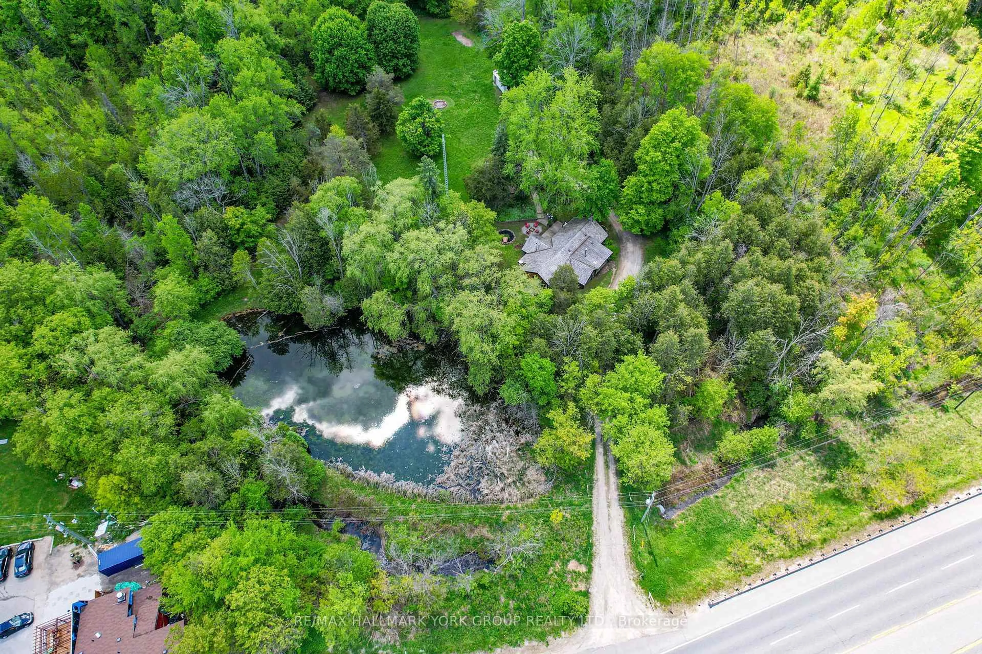 A pic from outside/outdoor area/front of a property/back of a property/a pic from drone, forest/trees view for 16590 Hurontario St, Caledon Ontario L7K 1W3