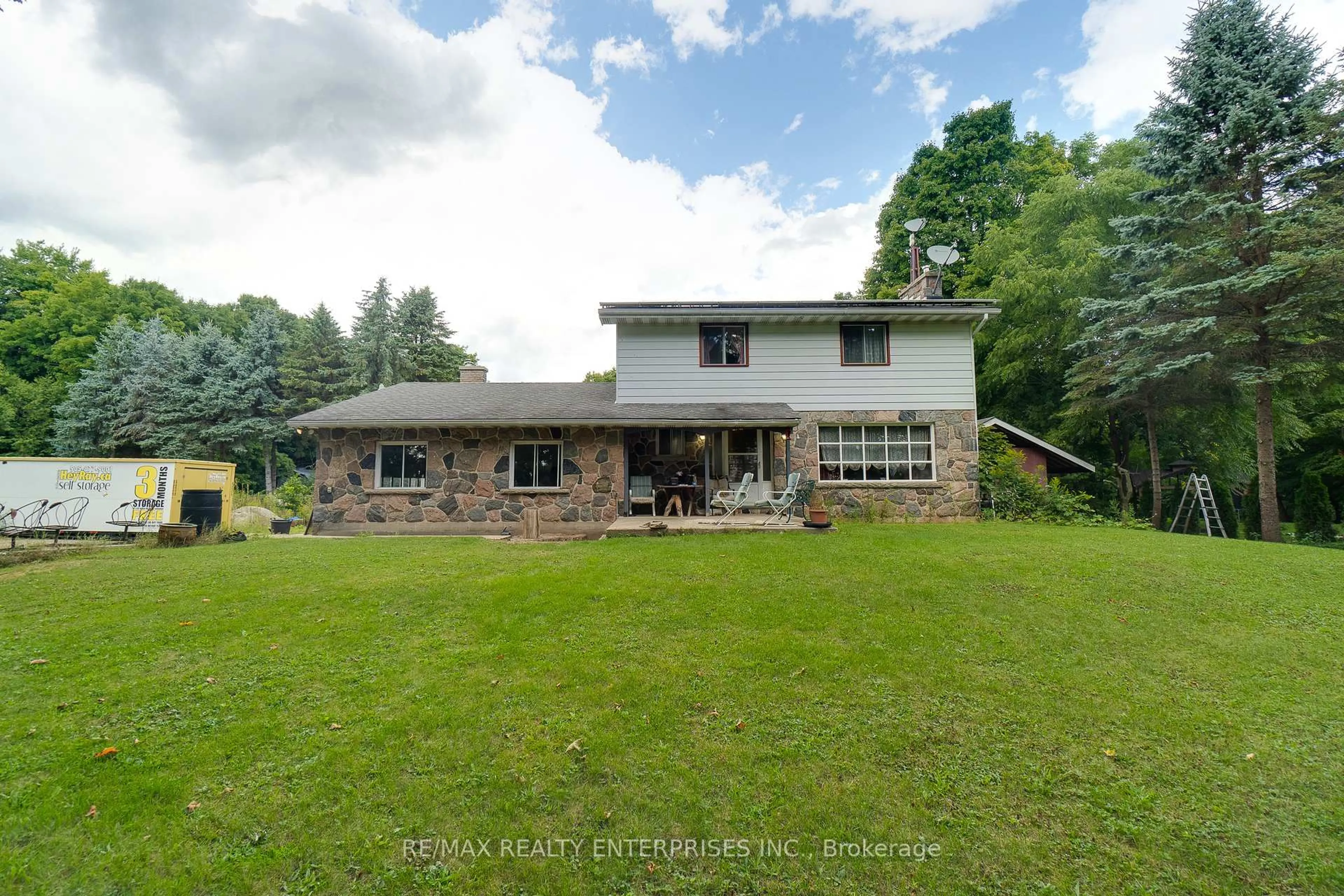A pic from outside/outdoor area/front of a property/back of a property/a pic from drone, unknown for 12909 5th Line, Halton Hills Ontario L0P 1H0