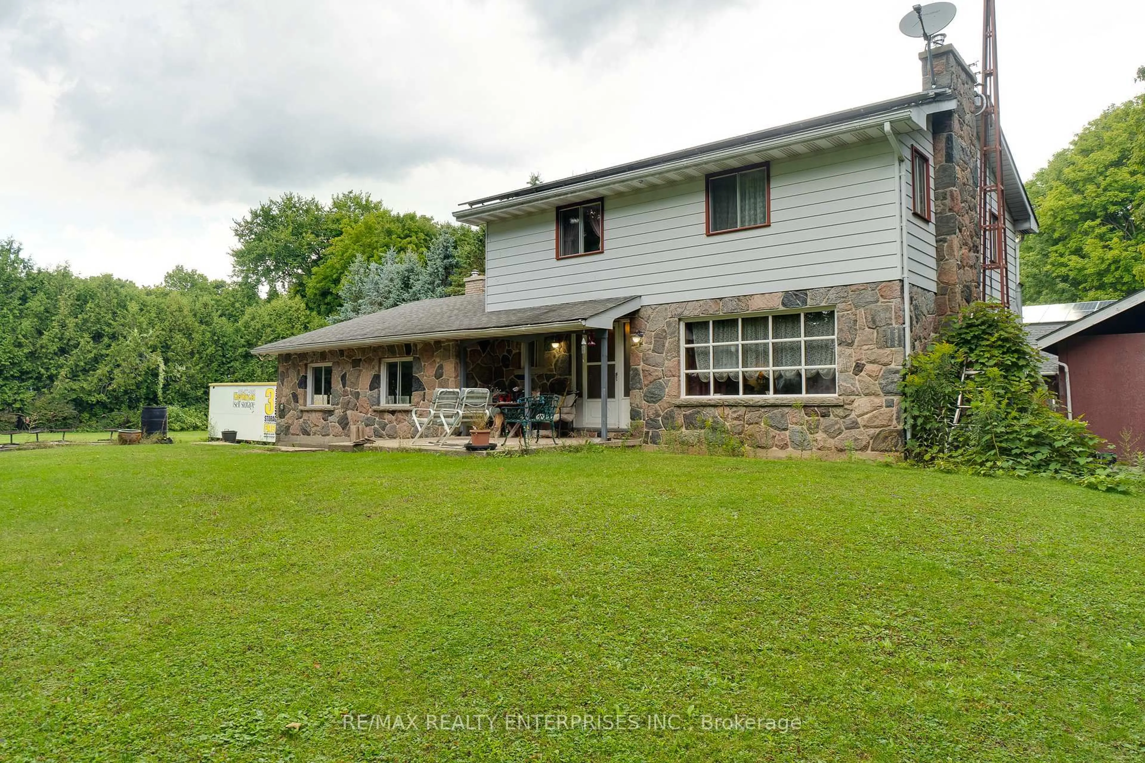 A pic from outside/outdoor area/front of a property/back of a property/a pic from drone, unknown for 12909 5th Line, Halton Hills Ontario L0P 1H0