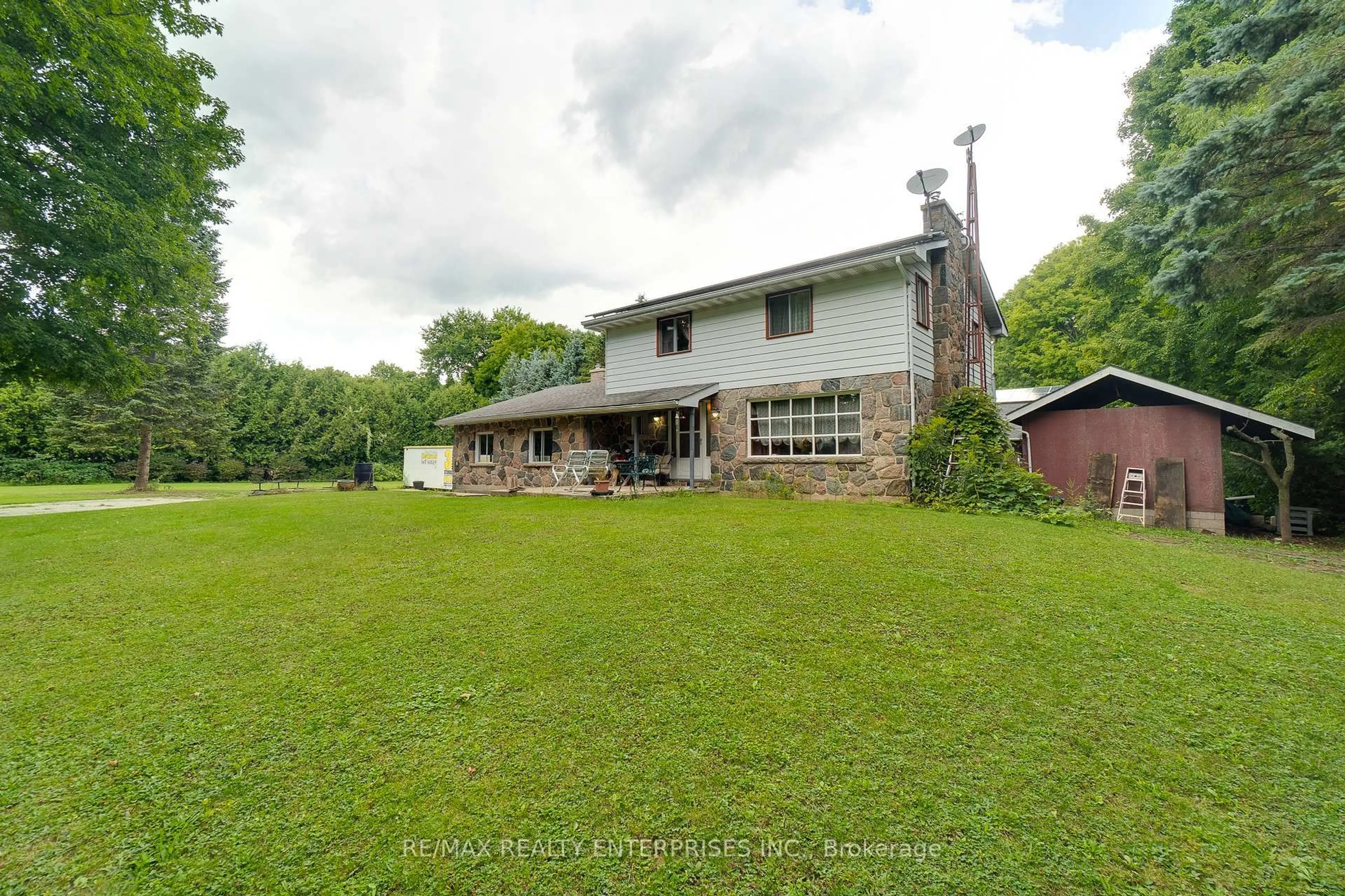 A pic from outside/outdoor area/front of a property/back of a property/a pic from drone, unknown for 12909 5th Line, Halton Hills Ontario L0P 1H0
