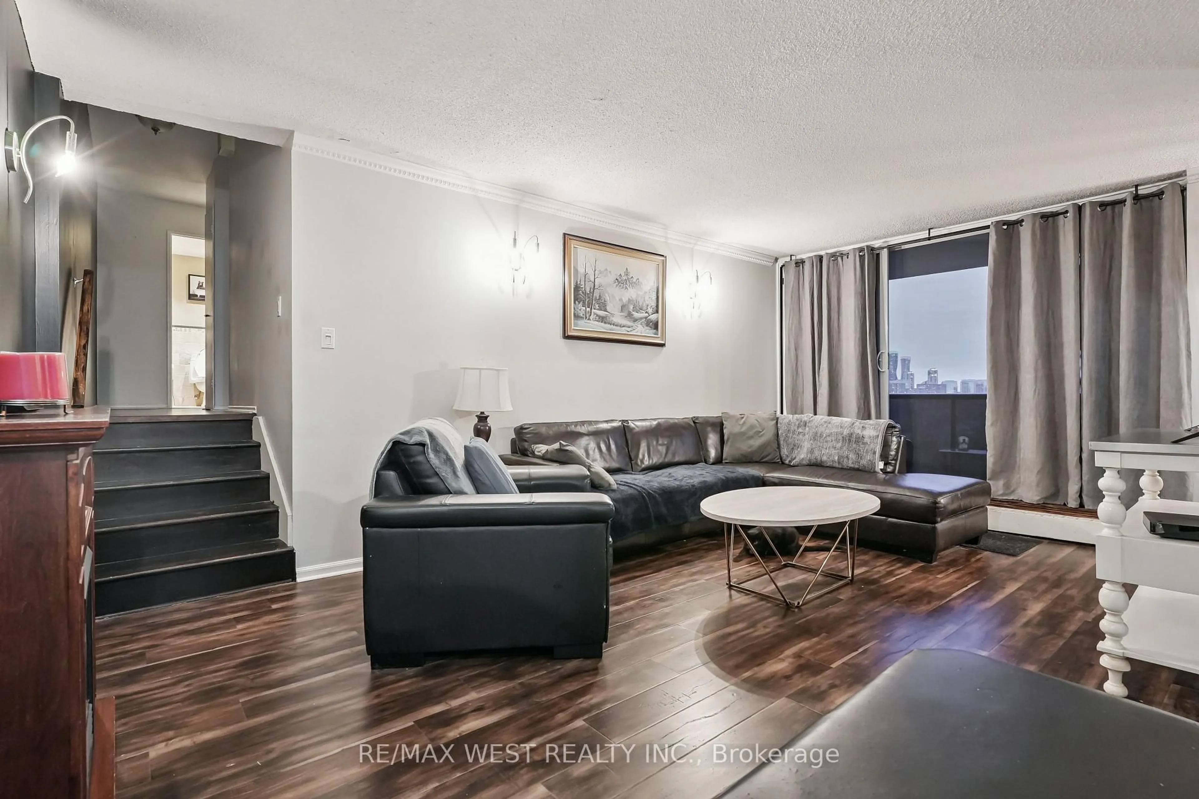 Living room with furniture, unknown for 530 Lolita Gdns #1203, Mississauga Ontario L5A 3T2