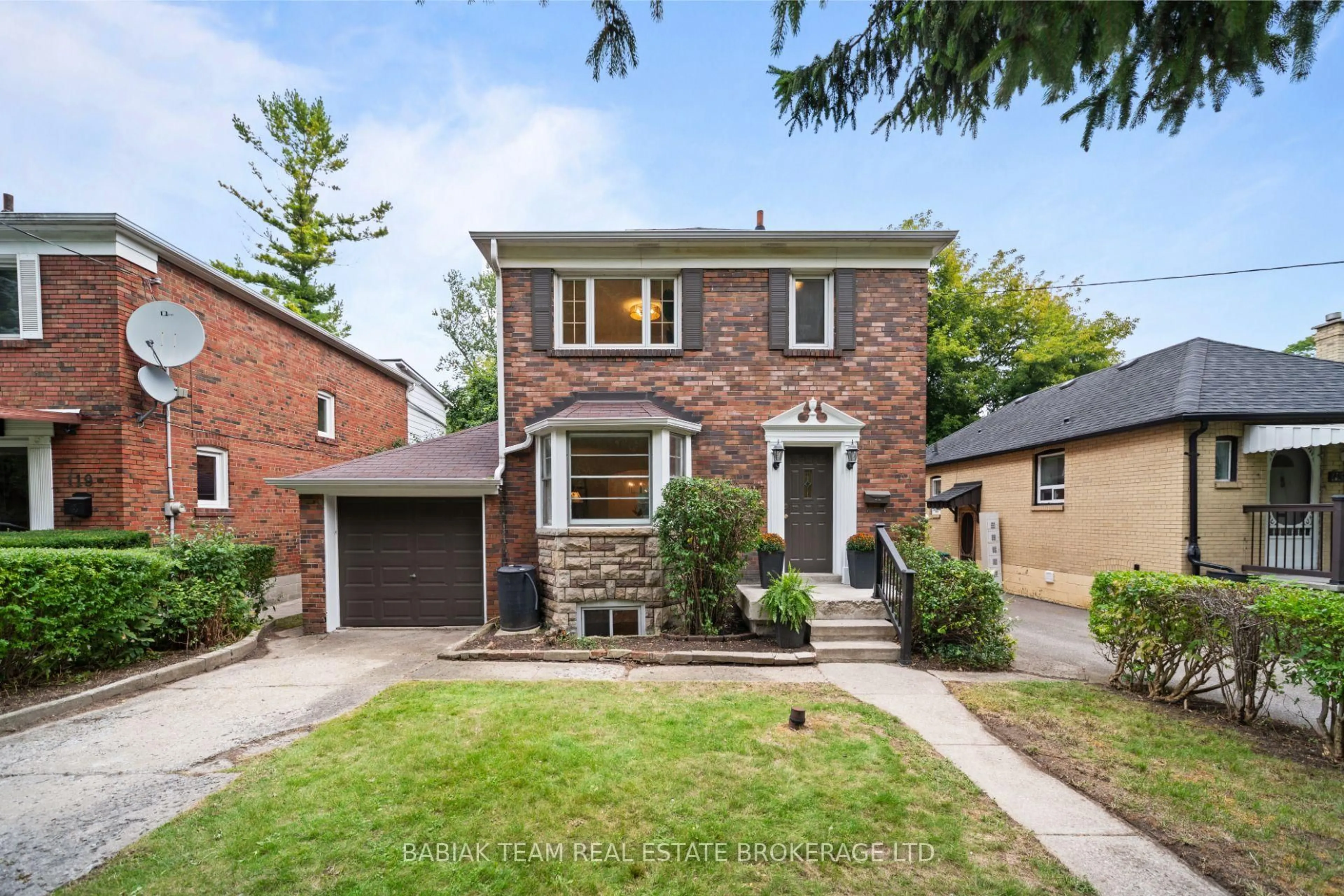 Home with brick exterior material, street for 117 South Kingsway, Toronto Ontario M6S 3T5
