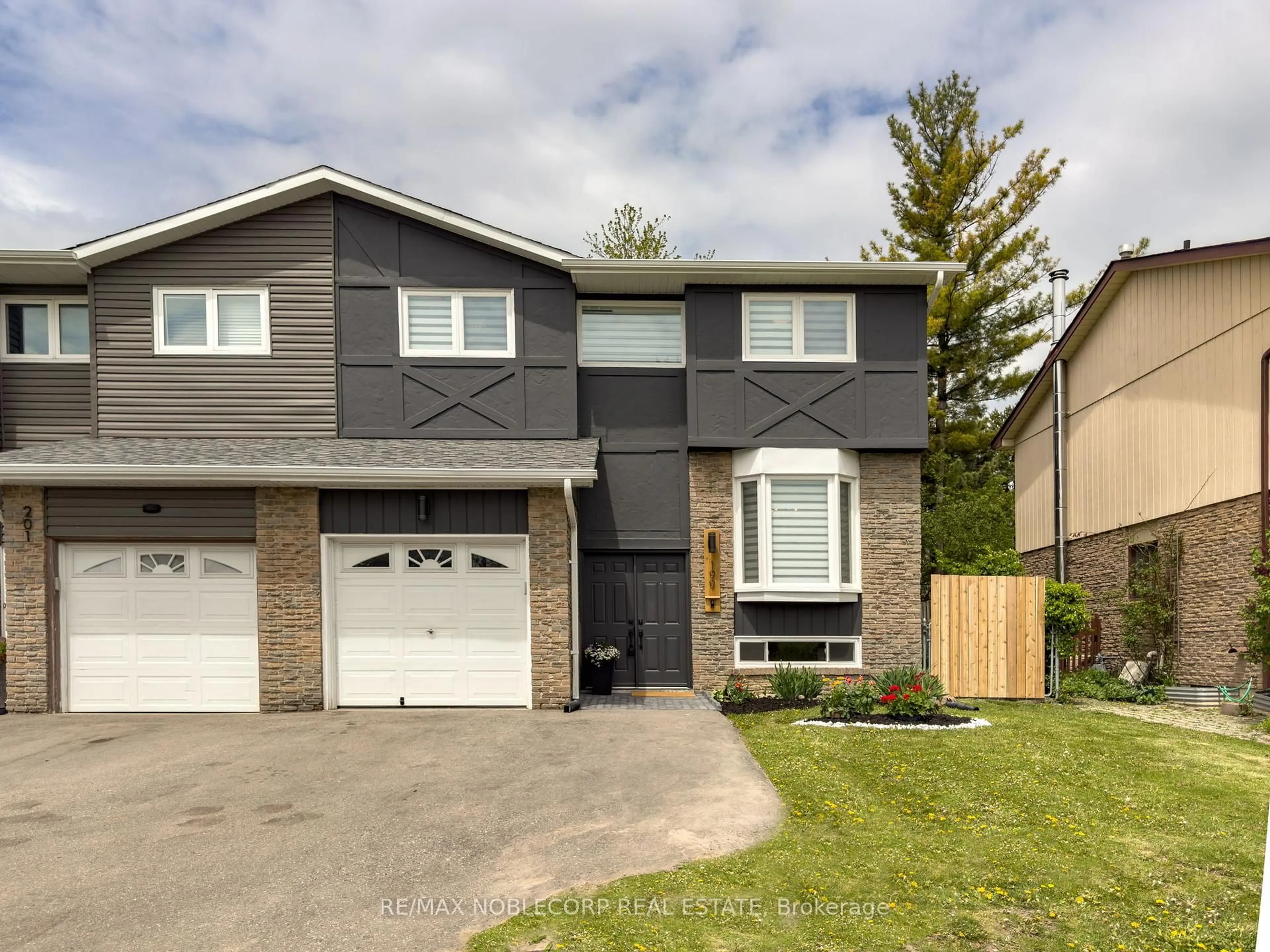 Home with brick exterior material, street for 199 Ellwood Dr, Caledon Ontario L7E 4W6