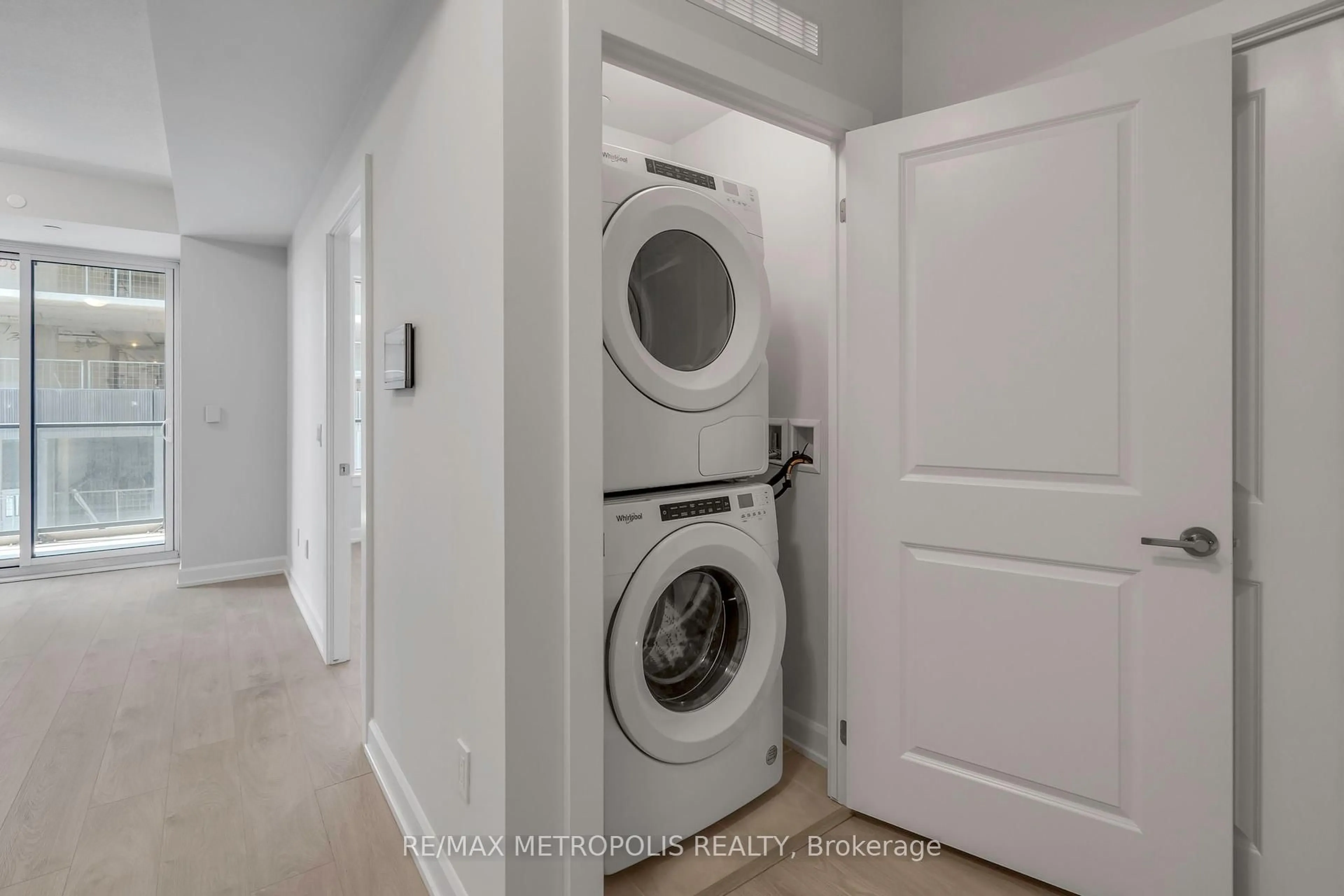Laundry room for 3220 William Coltson Ave #515, Oakville Ontario L6H 7X9