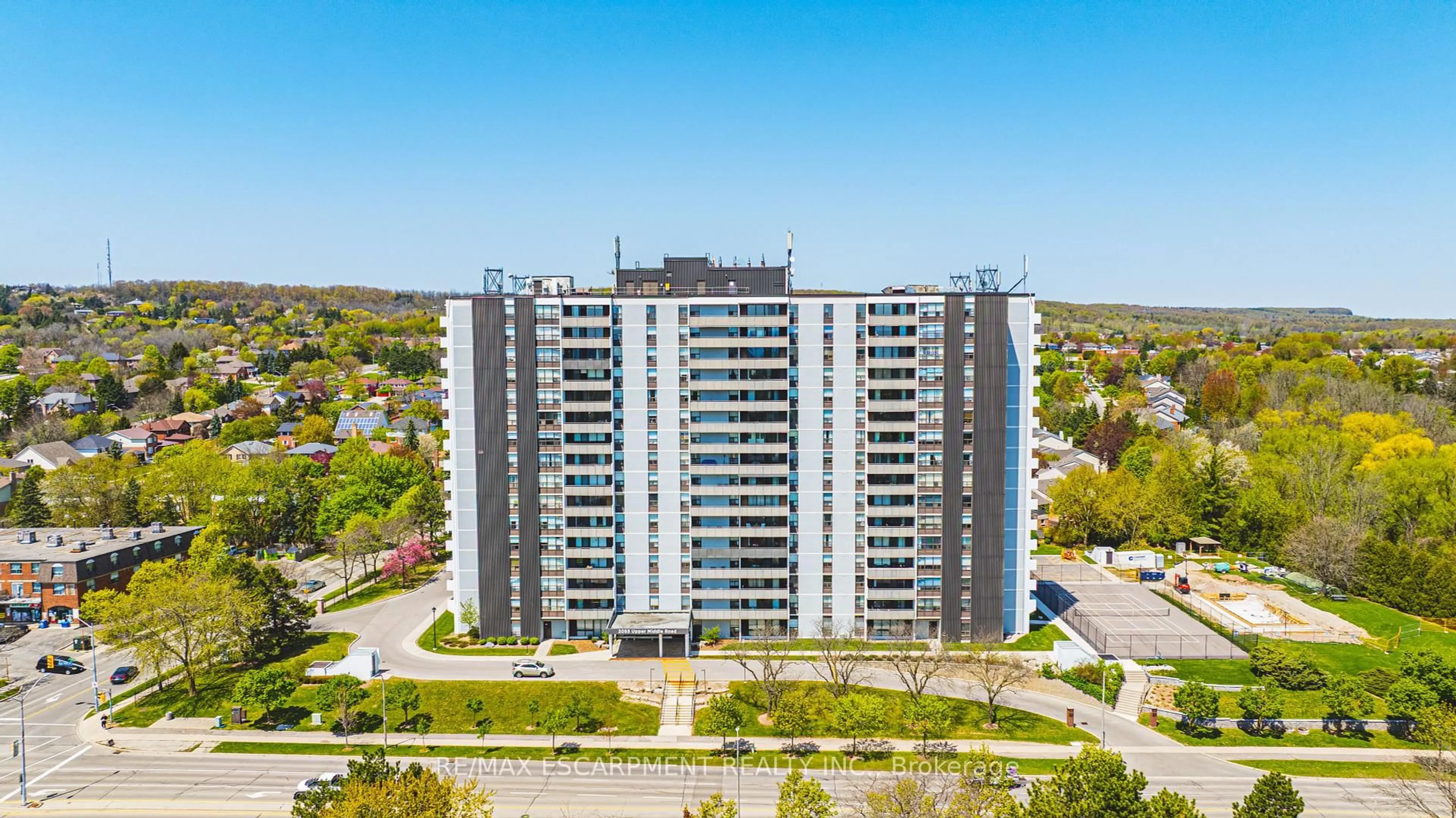 A pic from outside/outdoor area/front of a property/back of a property/a pic from drone, city buildings view from balcony for 2055 UPPER MIDDLE Rd #1403, Burlington Ontario L7P 3P4