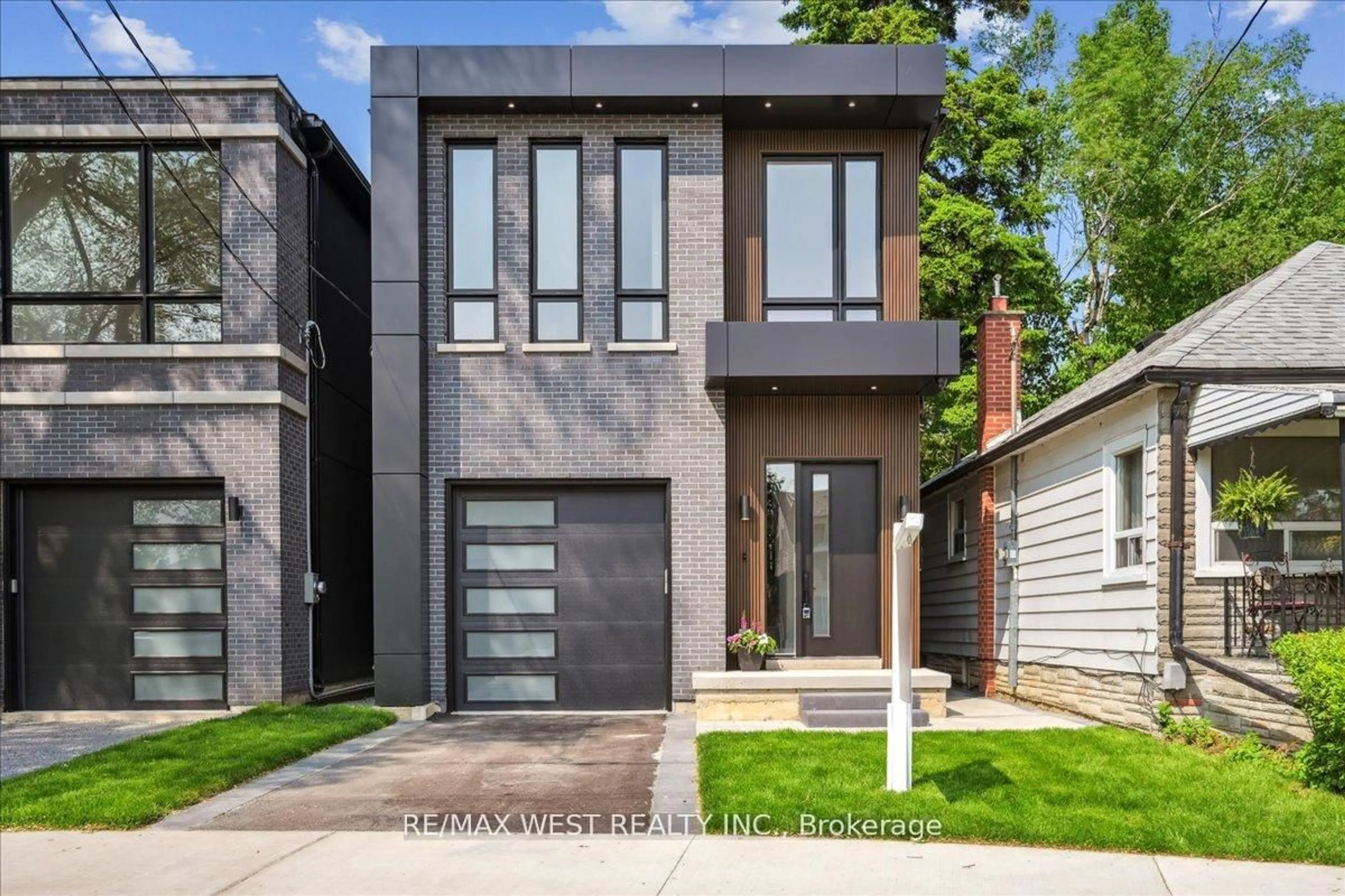 Home with brick exterior material, street for 12B Foch Ave, Toronto Ontario M8W 3X1