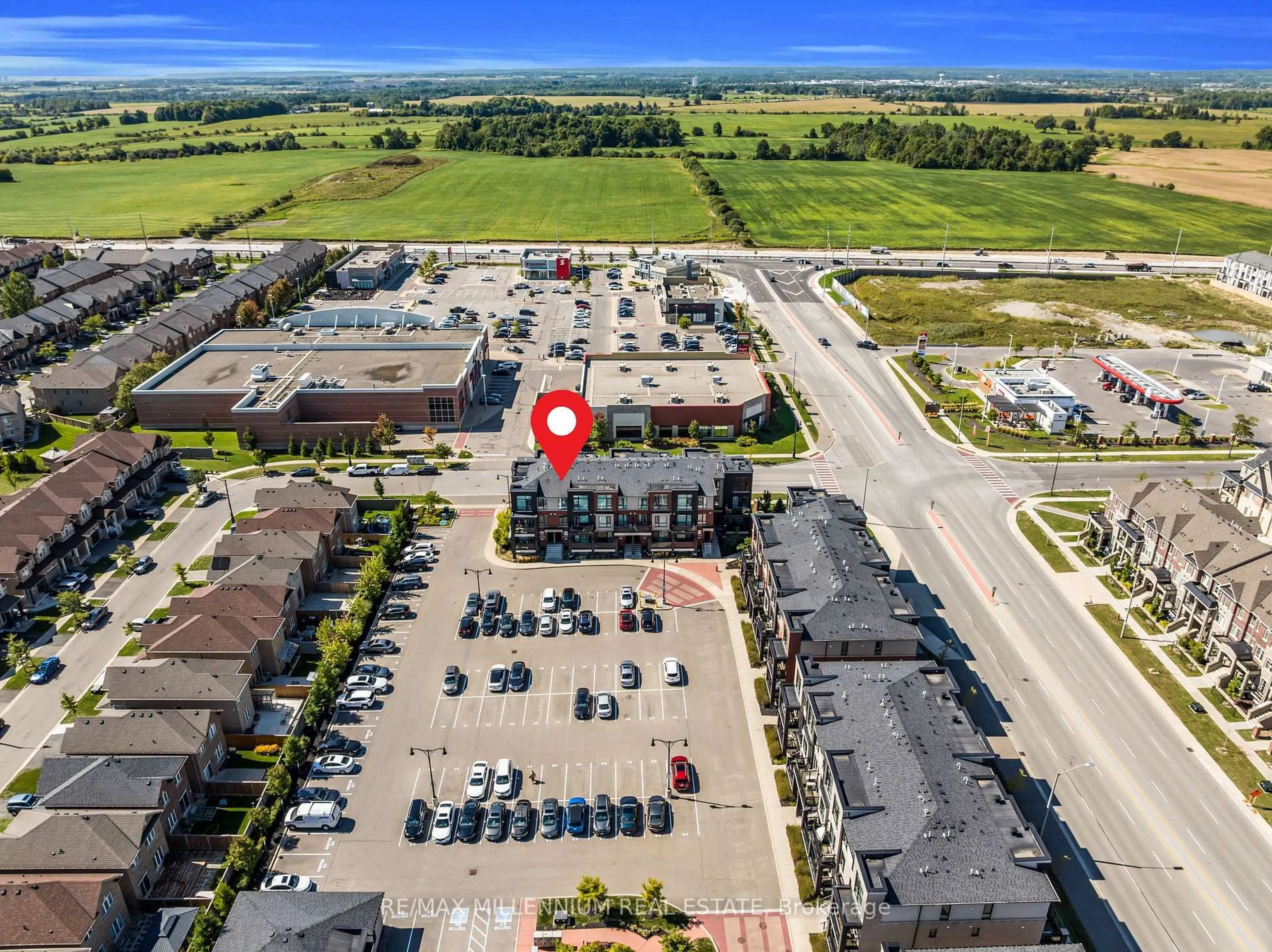 A pic from outside/outdoor area/front of a property/back of a property/a pic from drone, street for 100 Dufay Rd #8, Brampton Ontario L7A 4S3