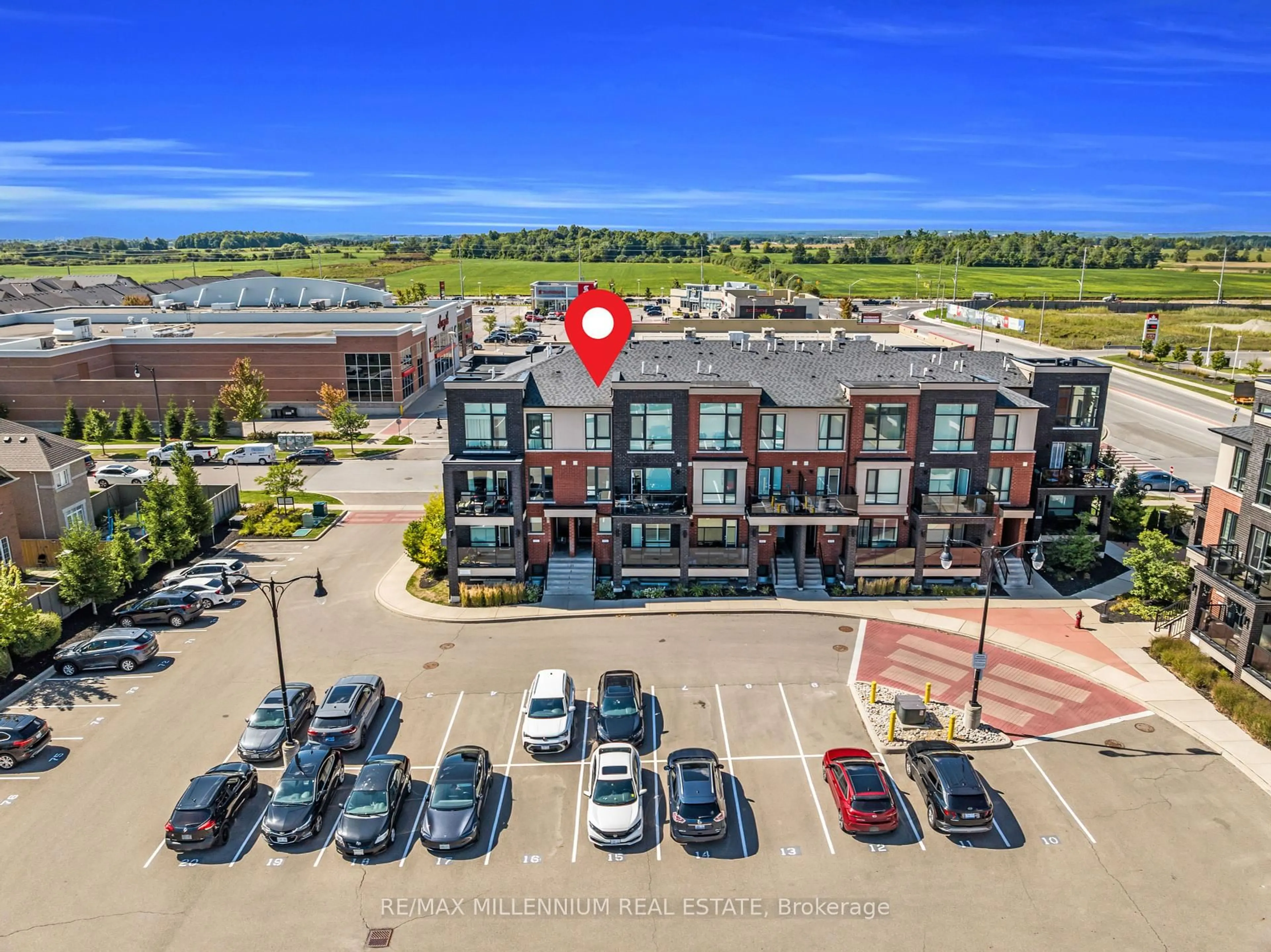 A pic from outside/outdoor area/front of a property/back of a property/a pic from drone, unknown for 100 Dufay Rd #8, Brampton Ontario L7A 4S3