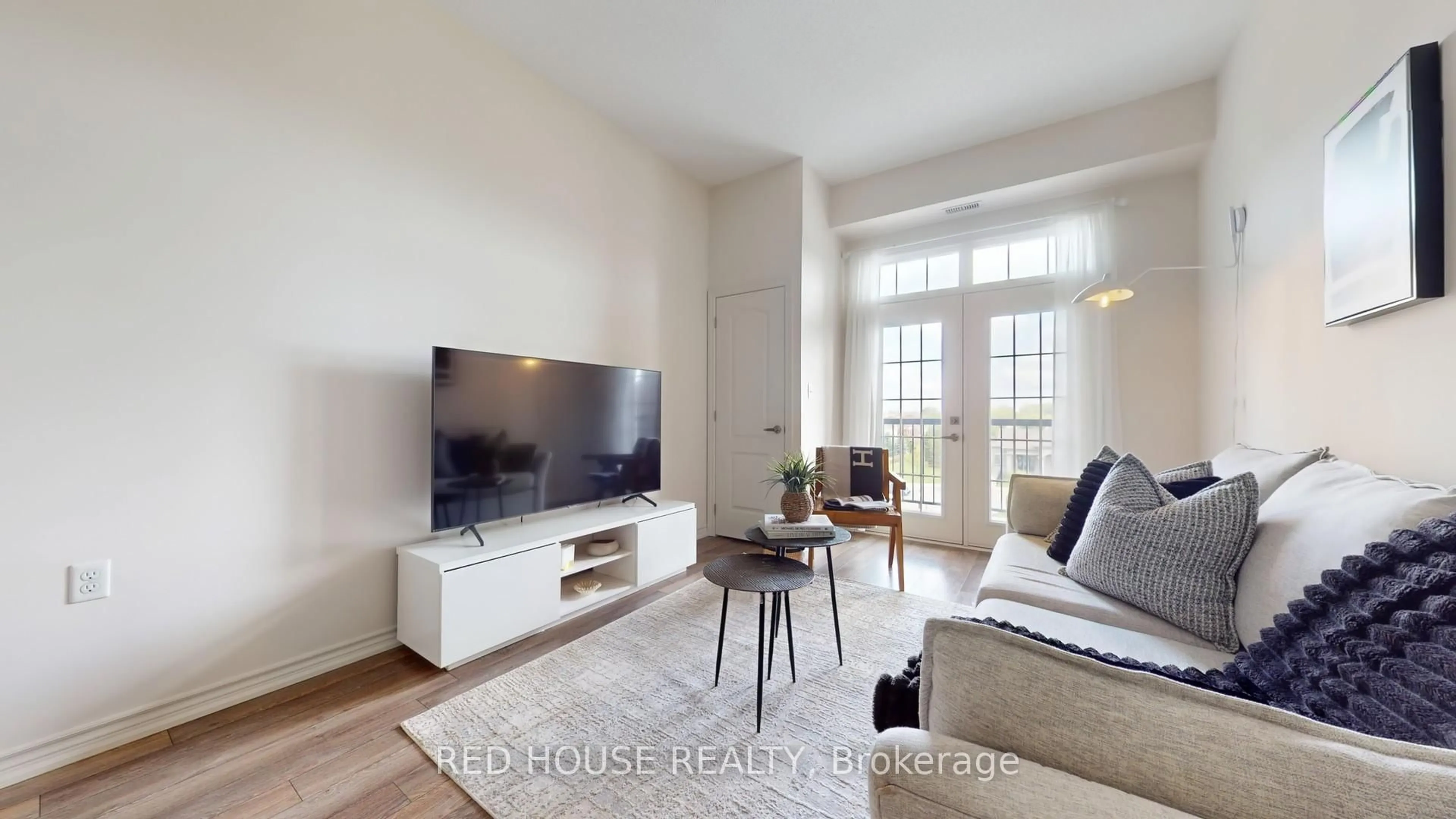 Living room with furniture, unknown for 1460 Main St #412, Milton Ontario L9T 8W5