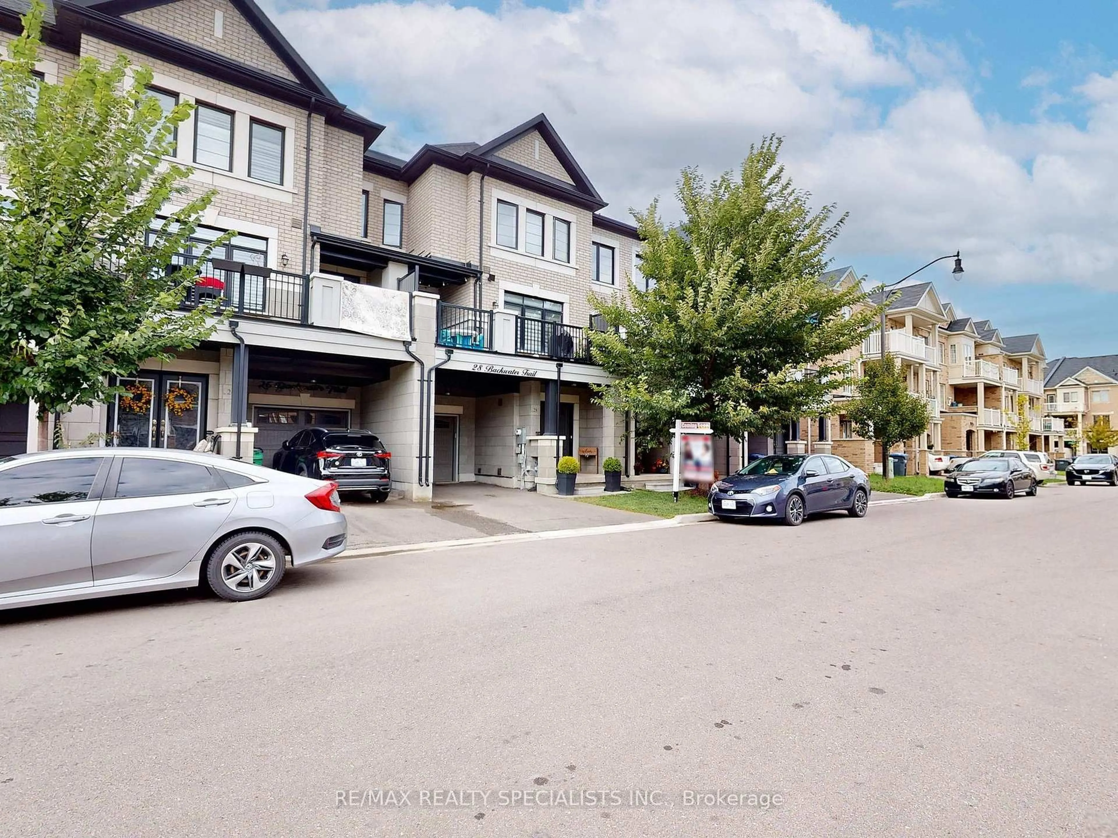 A pic from outside/outdoor area/front of a property/back of a property/a pic from drone, street for 28 Backwater Tr, Brampton Ontario L7C 0Y8
