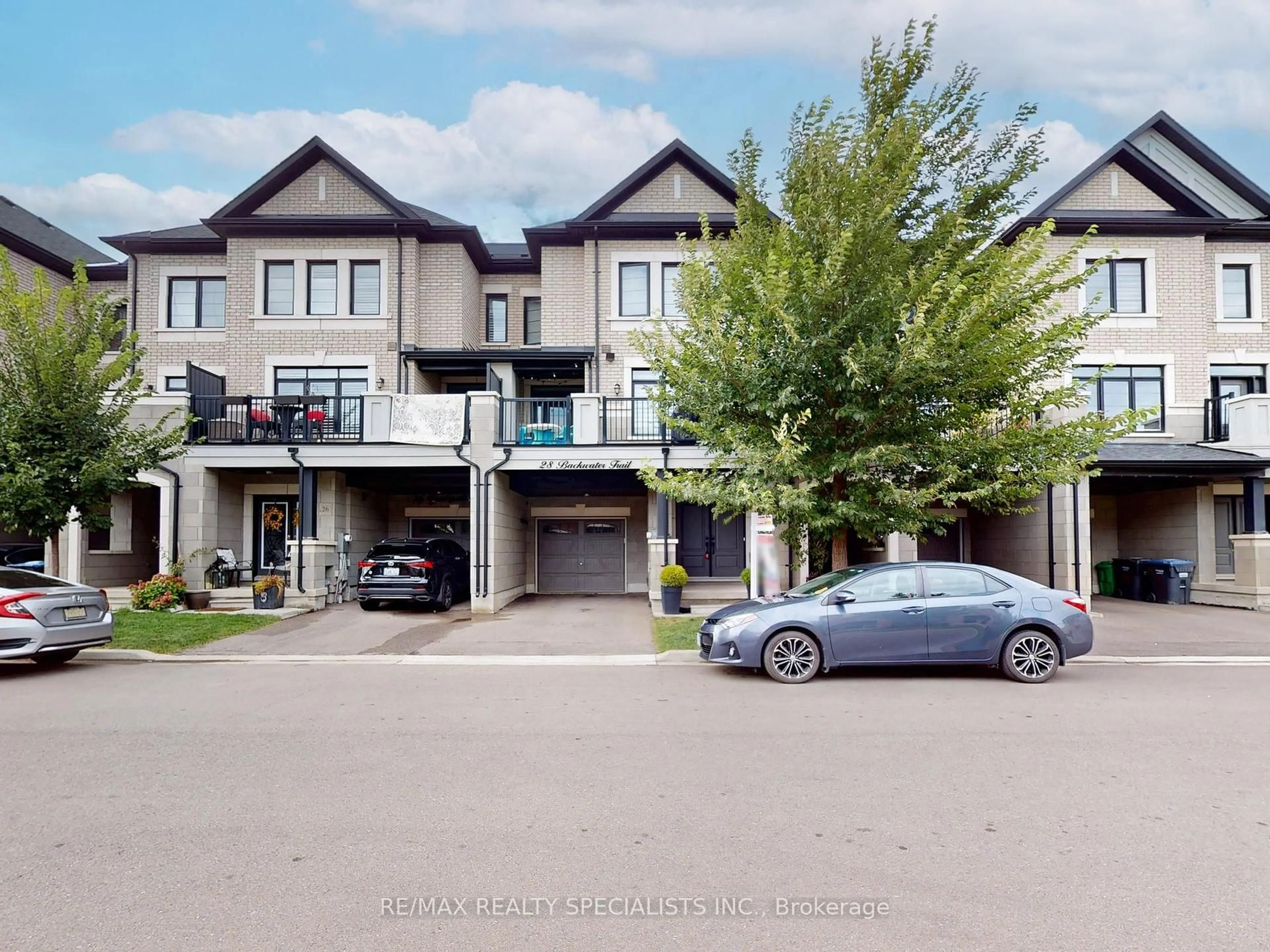 A pic from outside/outdoor area/front of a property/back of a property/a pic from drone, street for 28 Backwater Tr, Brampton Ontario L7C 0Y8