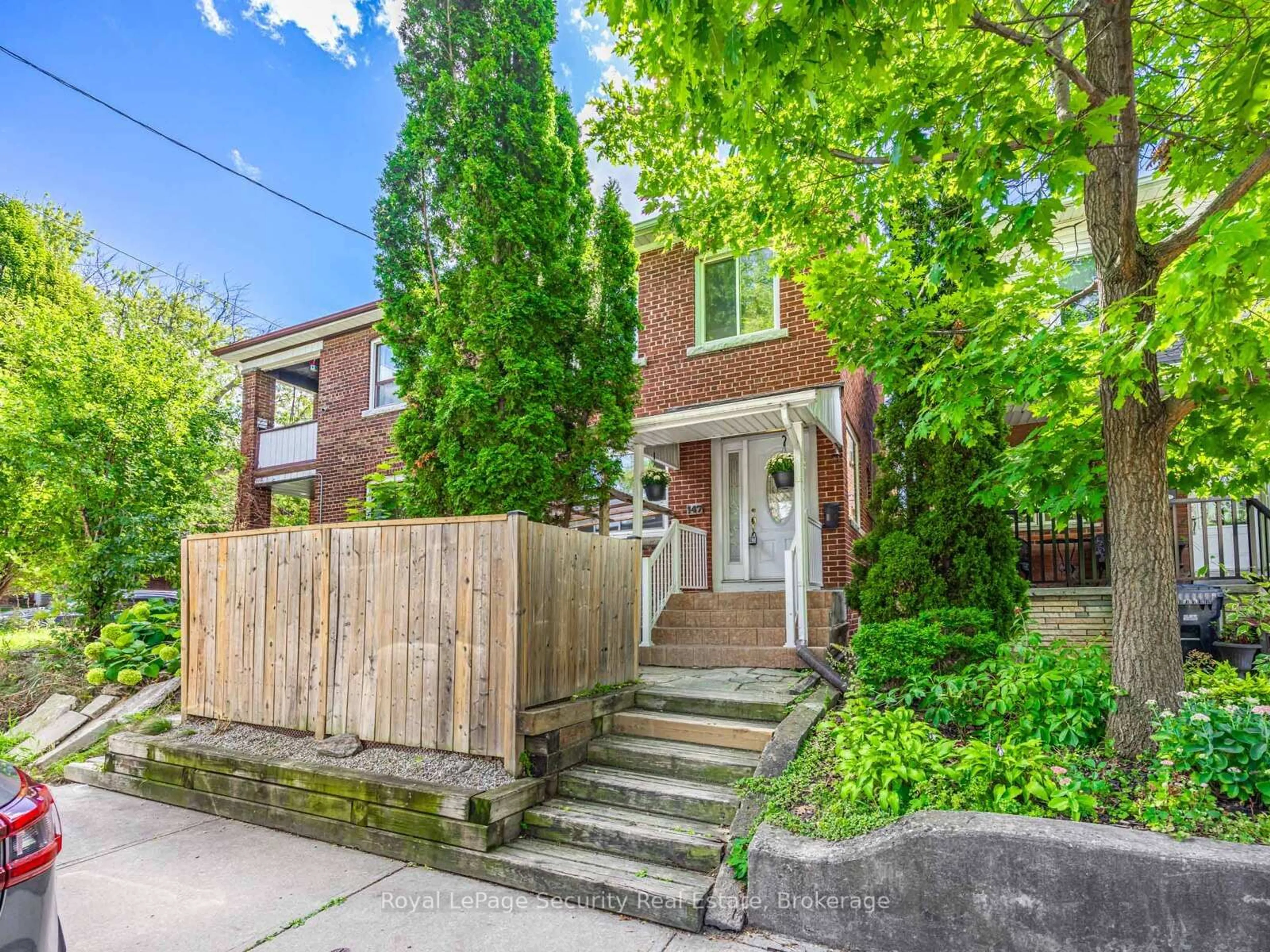 Home with brick exterior material, street for 147 Hope St, Toronto Ontario M6E 1K4