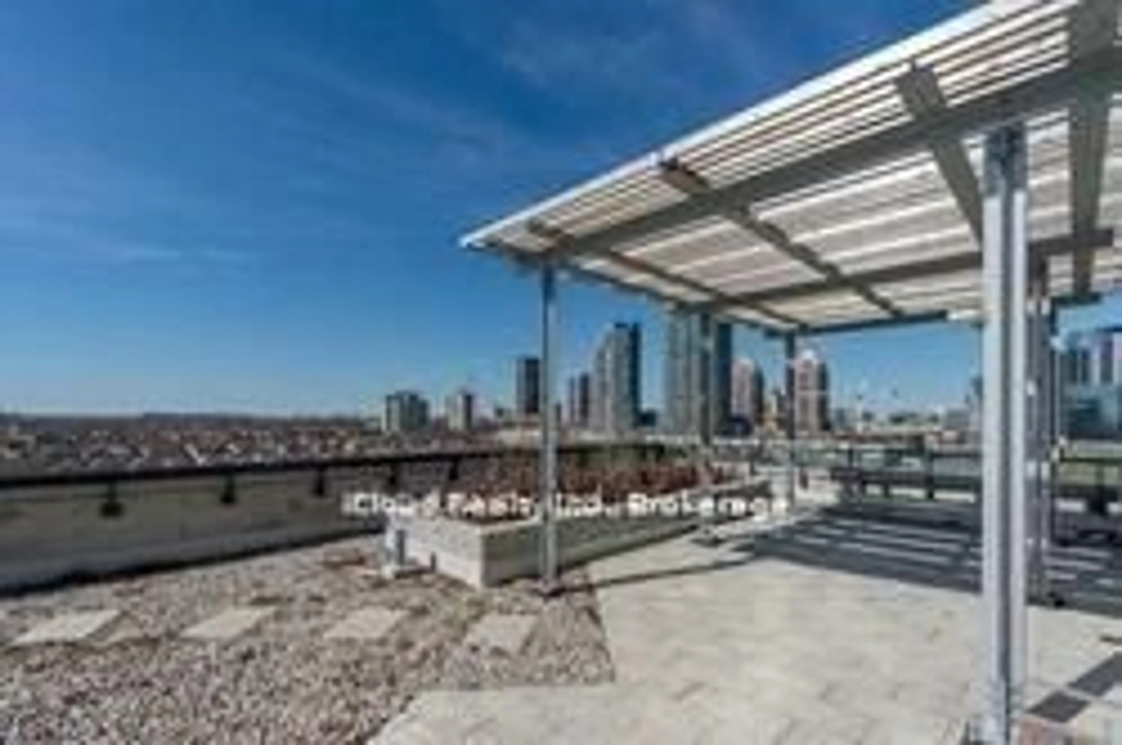Patio, city buildings view from balcony for 3985 Grand Park Dr #2108, Mississauga Ontario L5B 0H8