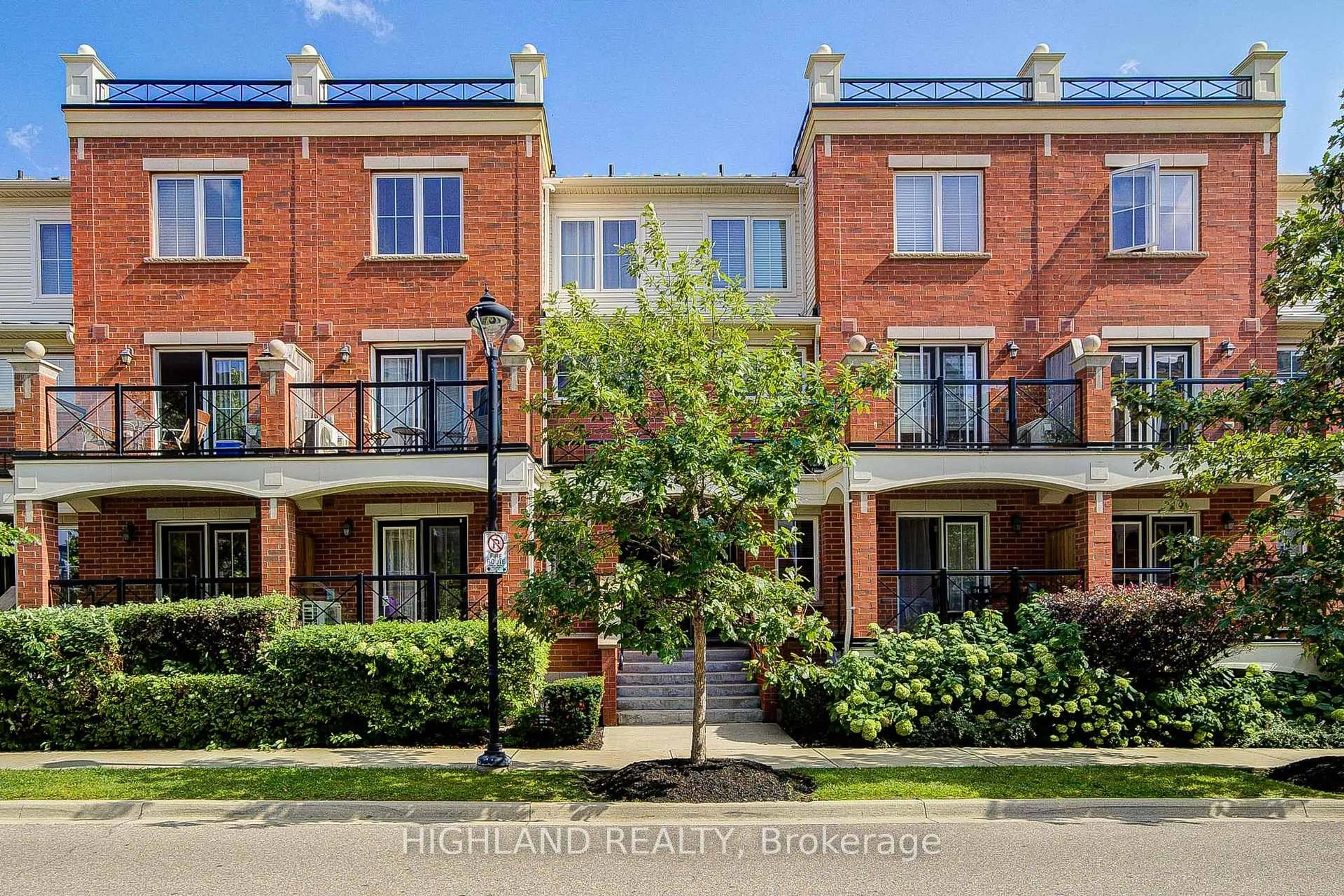 Home with brick exterior material, street for 2460 Post Rd #7, Oakville Ontario L6H 0J2