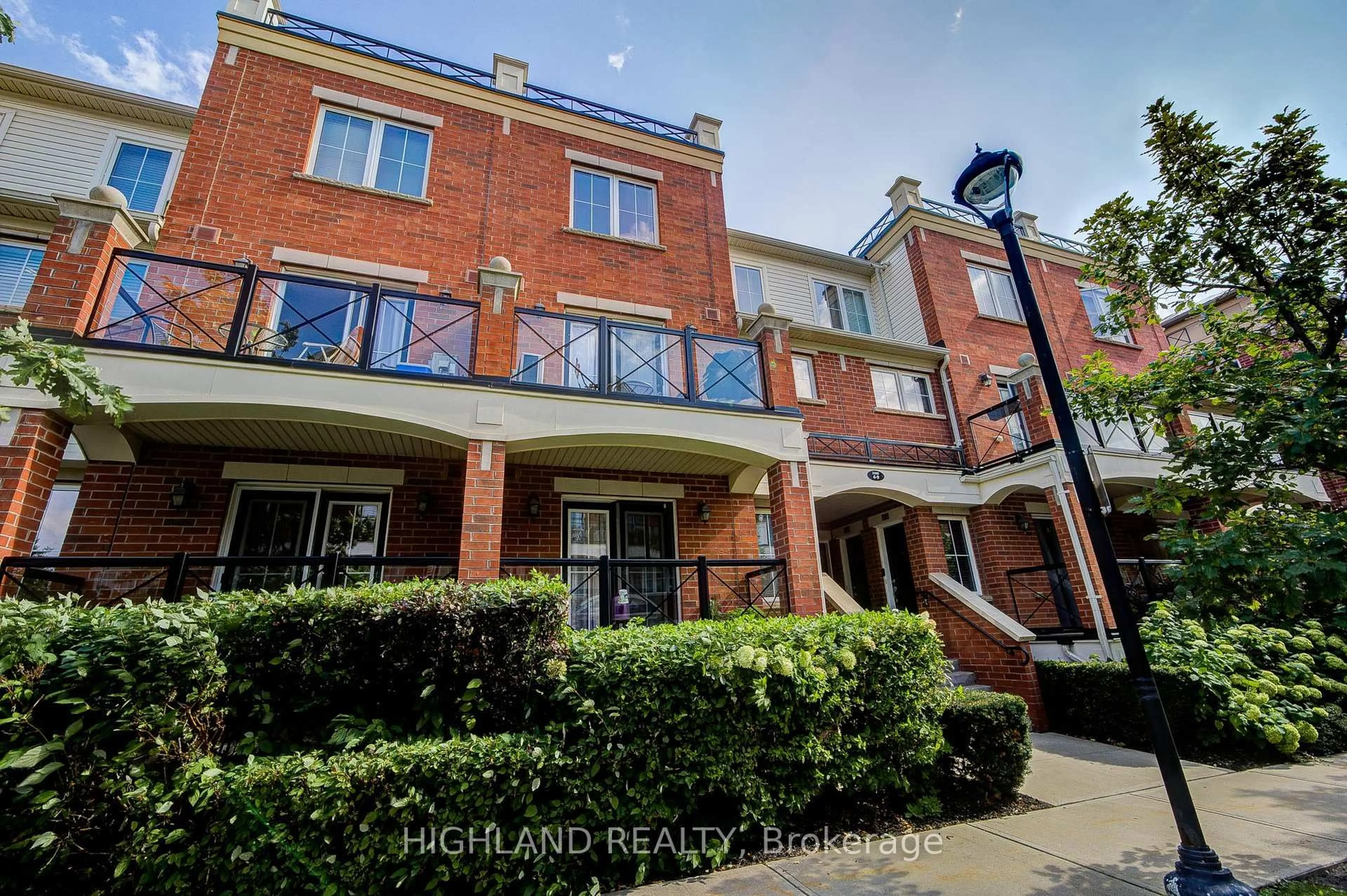 A pic from outside/outdoor area/front of a property/back of a property/a pic from drone, street for 2460 Post Rd #7, Oakville Ontario L6H 0J2