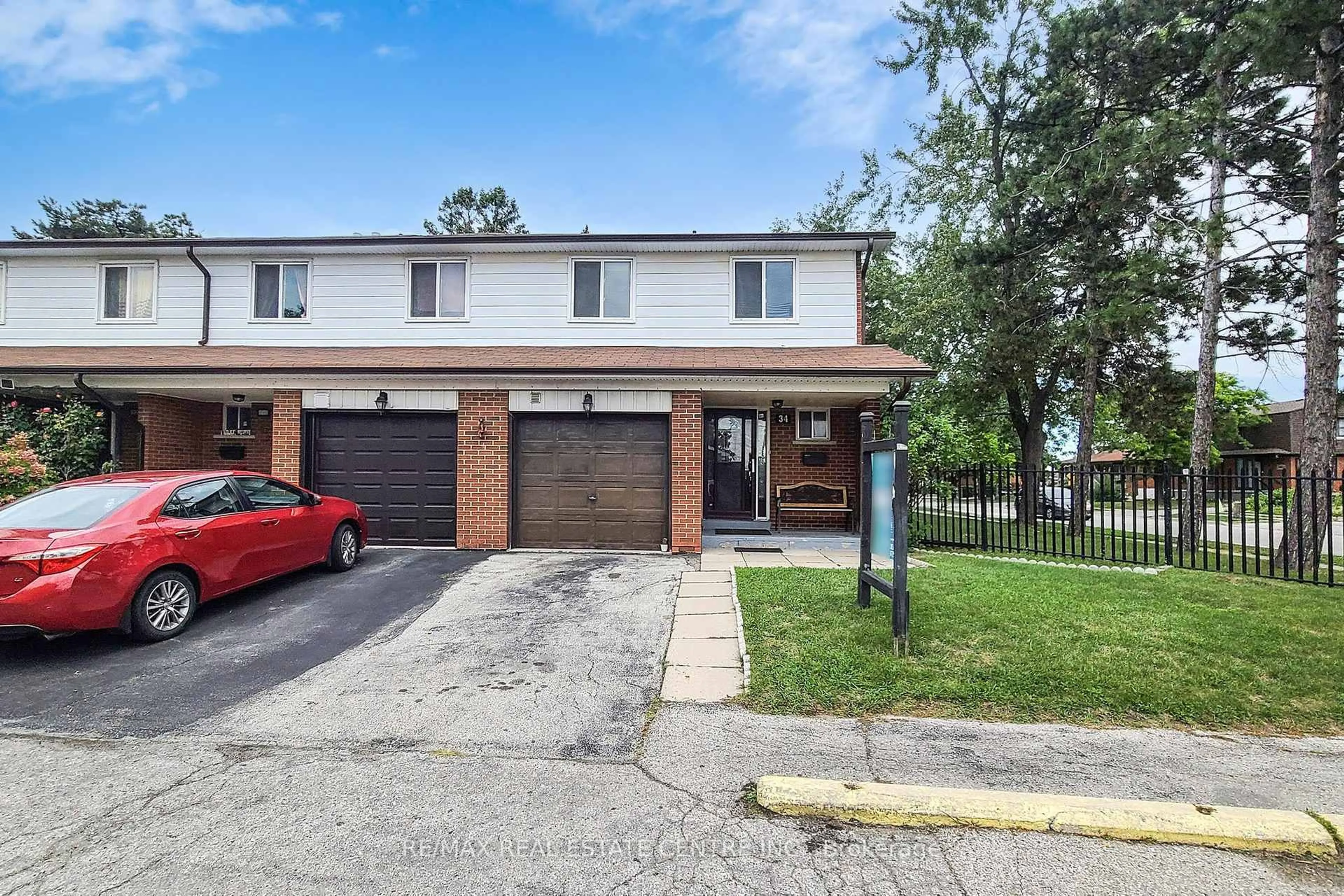 Home with brick exterior material, street for 7406 Darcel Ave #34, Mississauga Ontario L4T 2X5