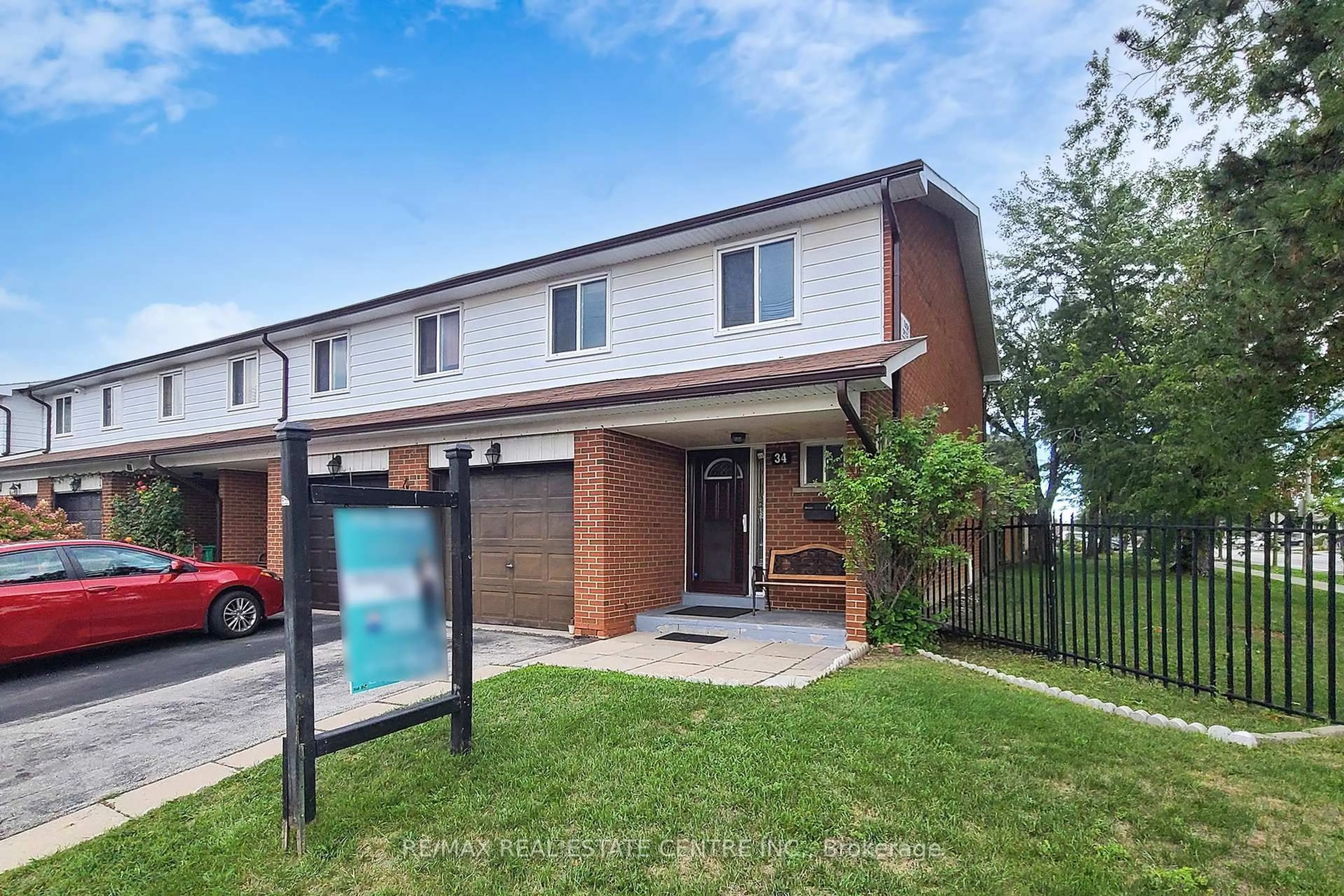 Home with brick exterior material, street for 7406 Darcel Ave #34, Mississauga Ontario L4T 2X5