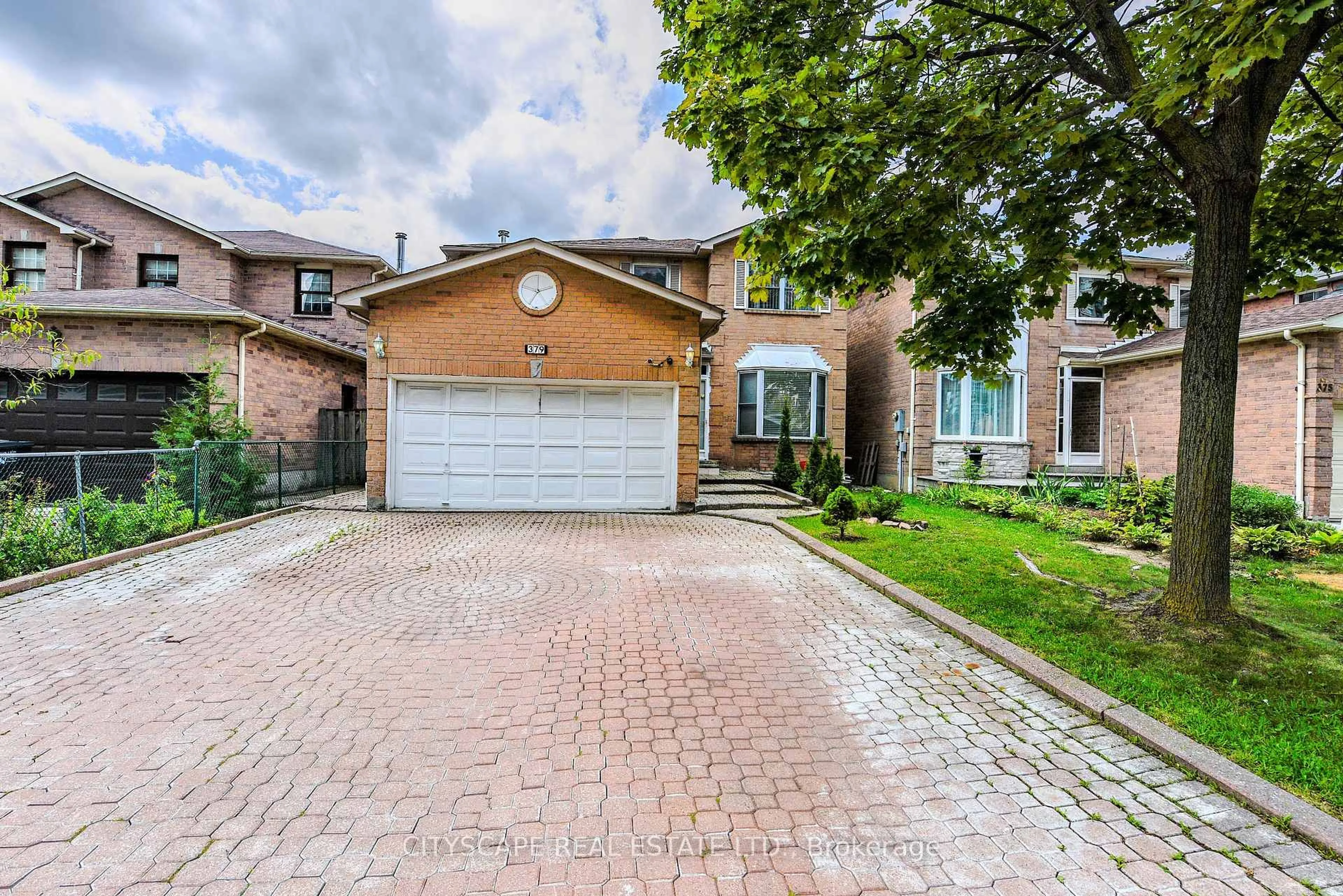 Home with brick exterior material, street for 379 Wallenberg Cres, Mississauga Ontario L5B 3N1
