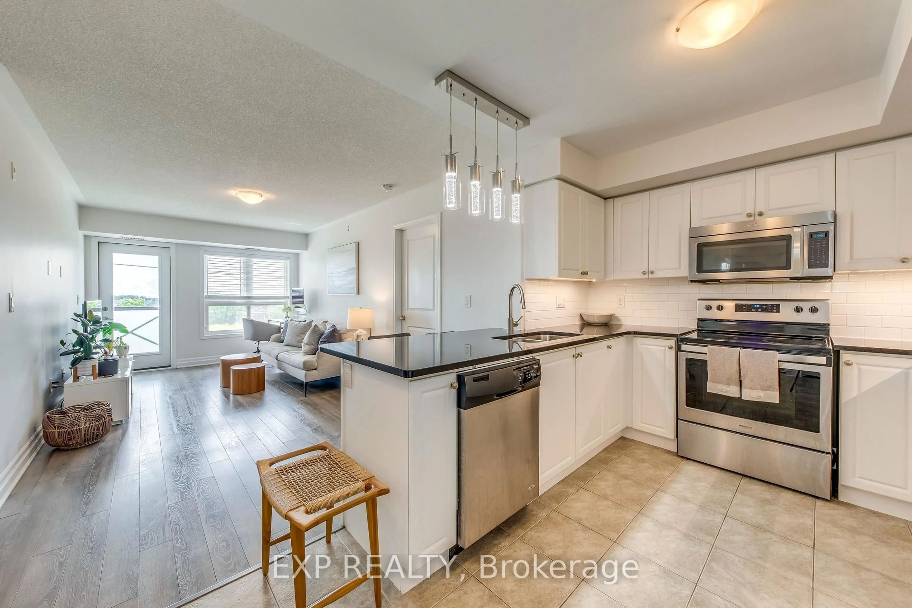 Open concept kitchen, ceramic/tile floor for 1005 Nadalin Hts #406, Milton Ontario L9T 8R4