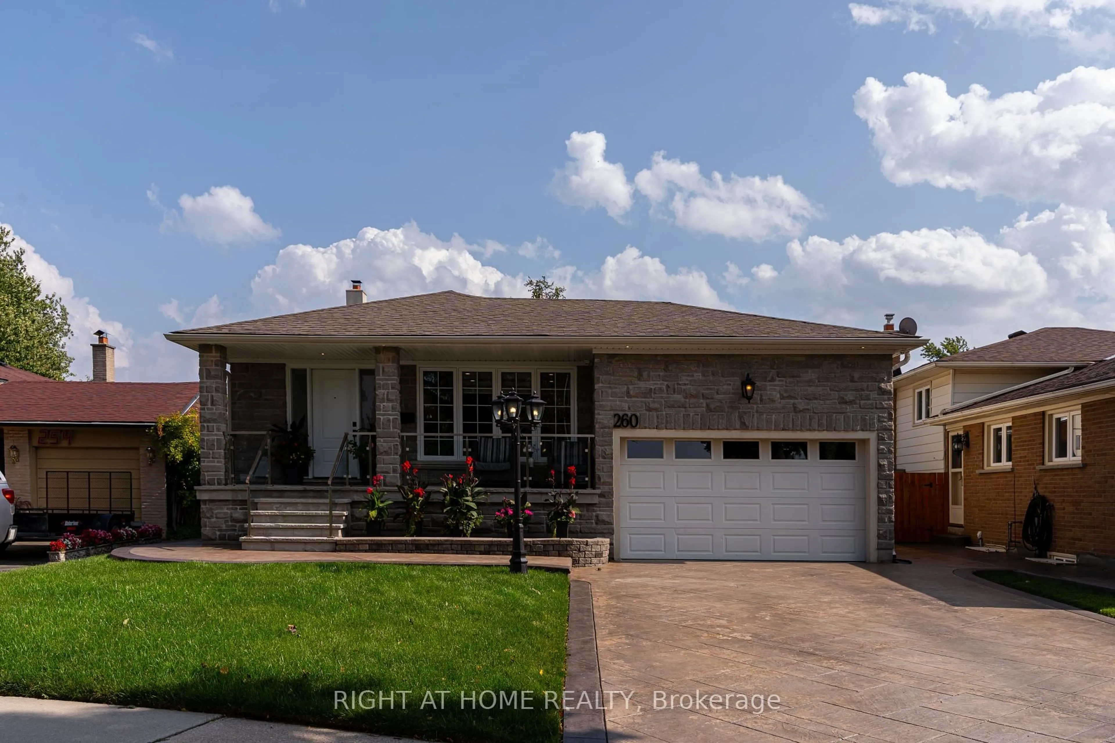 Home with brick exterior material, street for 260 Louis Dr, Mississauga Ontario L5B 1Y9