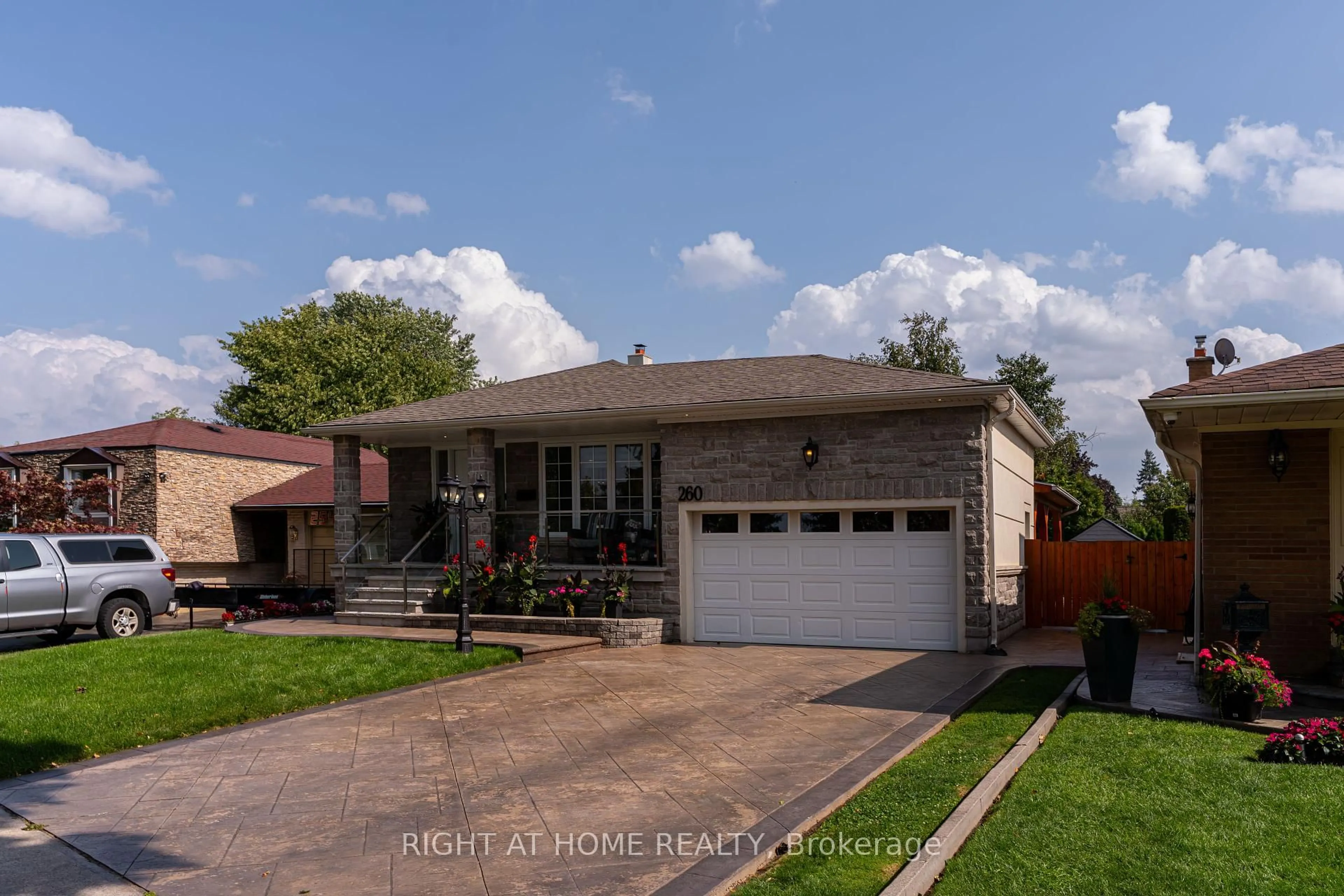 Home with brick exterior material, street for 260 Louis Dr, Mississauga Ontario L5B 1Y9