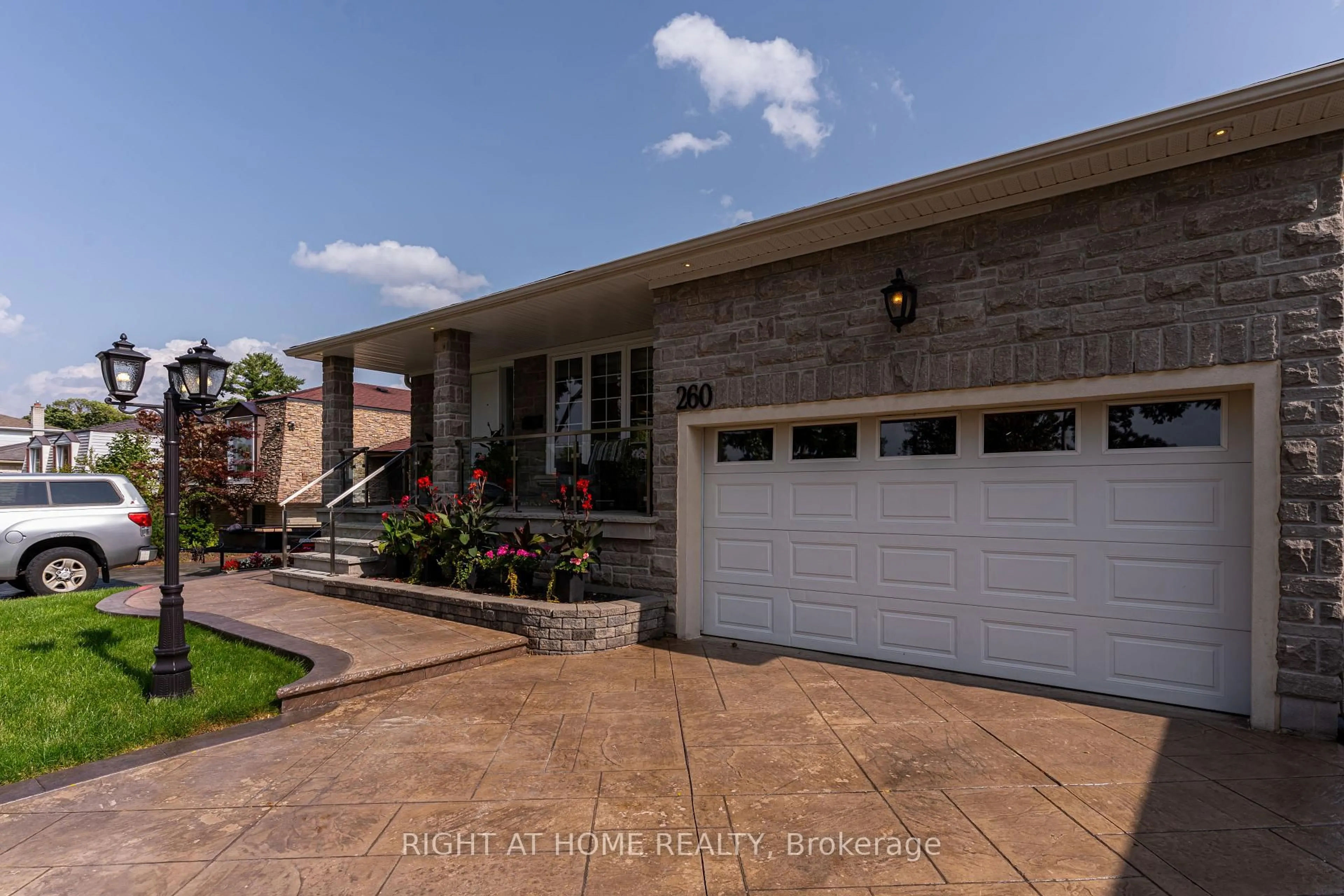 Home with brick exterior material, street for 260 Louis Dr, Mississauga Ontario L5B 1Y9