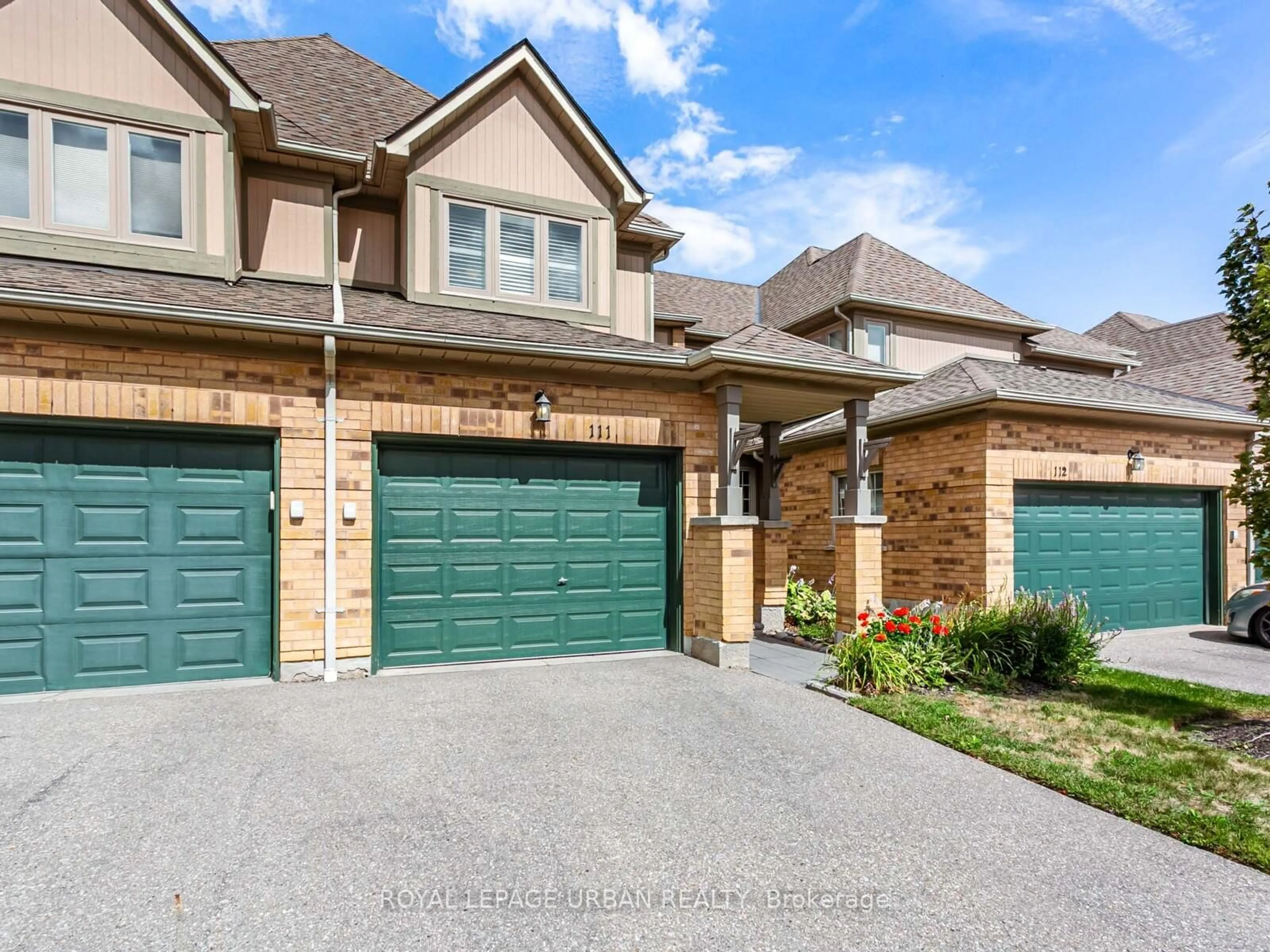 Home with brick exterior material, street for 5662 Glen Erin Dr #111, Mississauga Ontario L5M 5J2