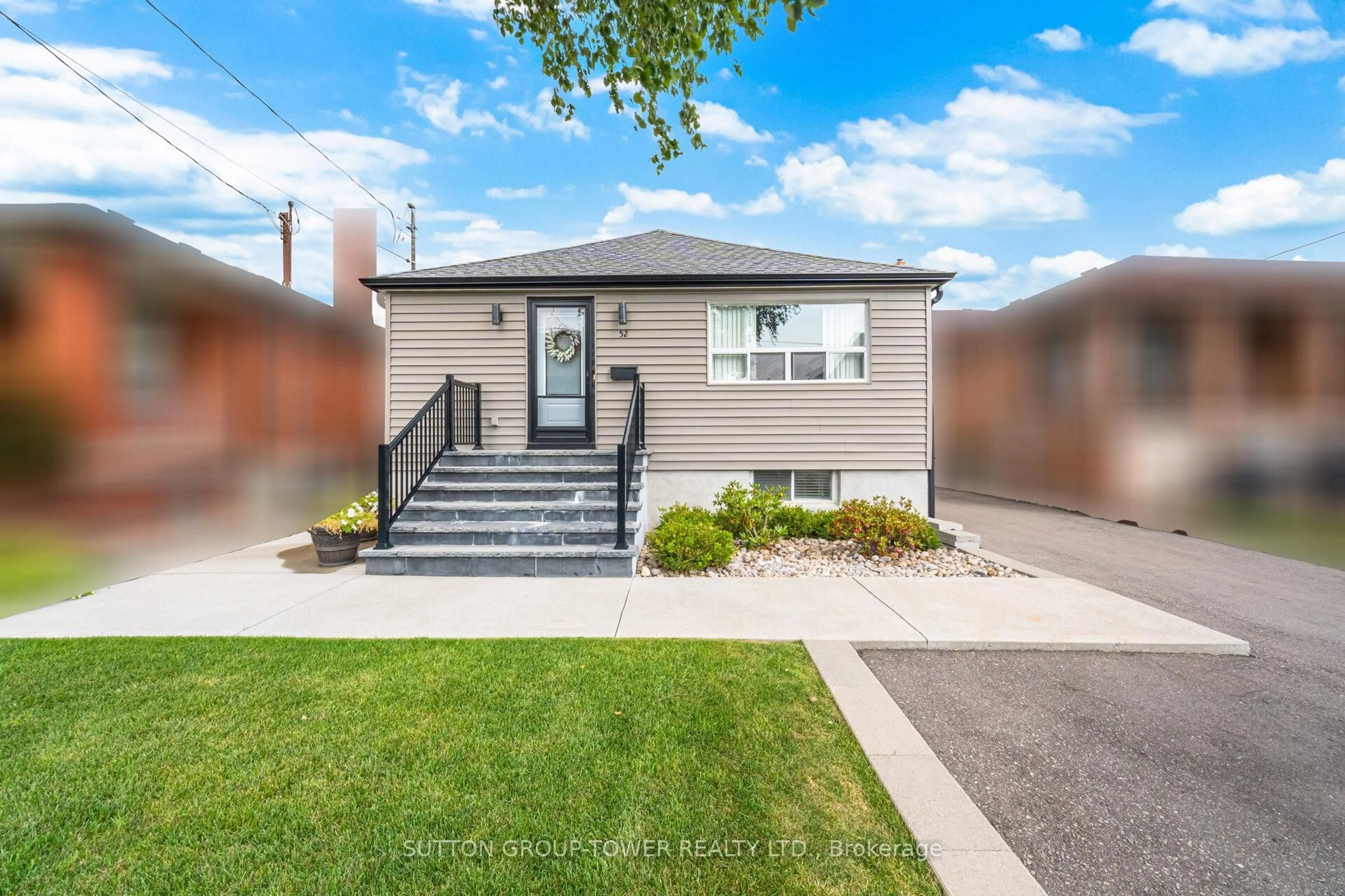 Home with vinyl exterior material, street for 52 Plewes Rd, Toronto Ontario M3K 1K5
