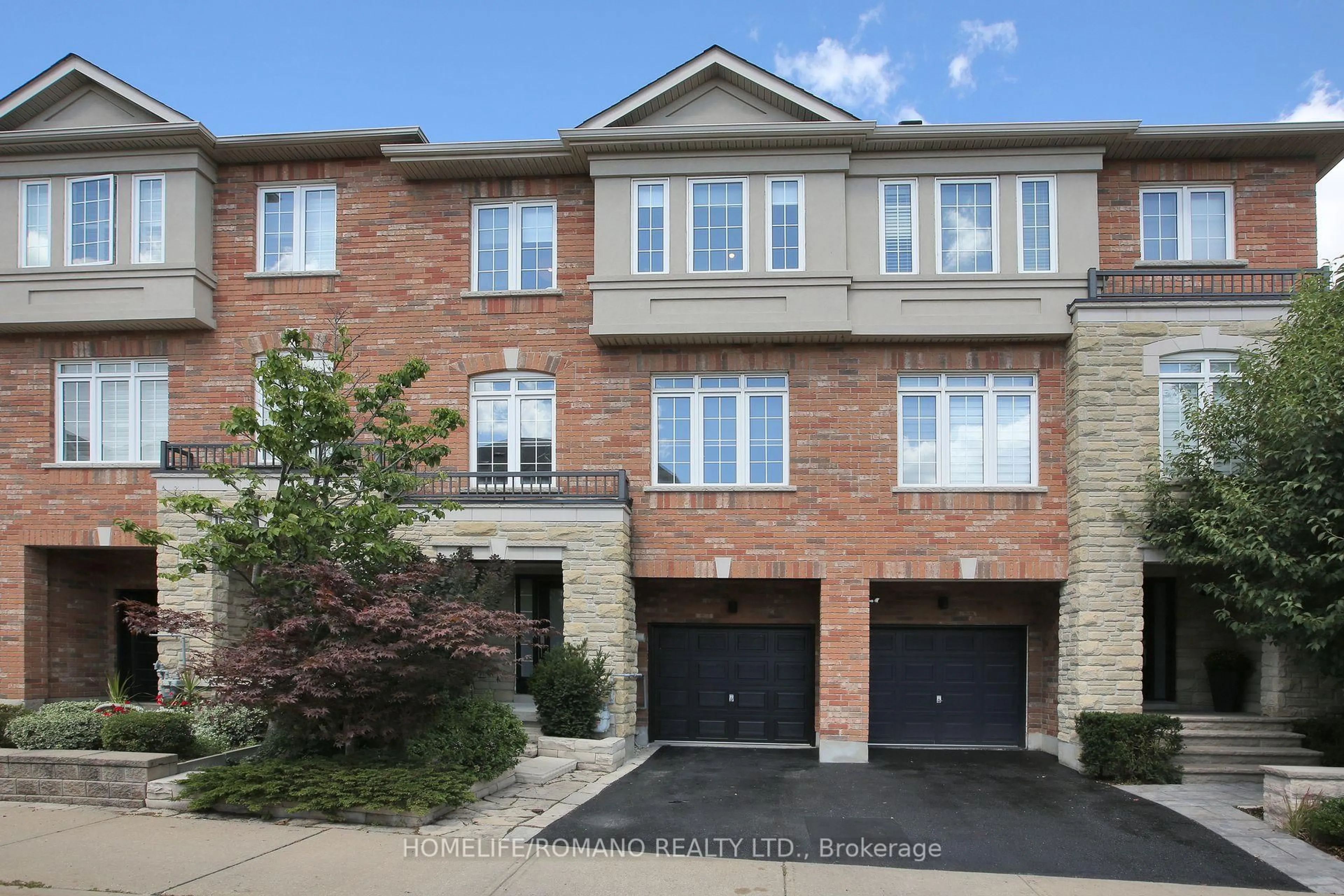 Home with brick exterior material, street for 14 Ramage Lane, Toronto Ontario M9C 5S6
