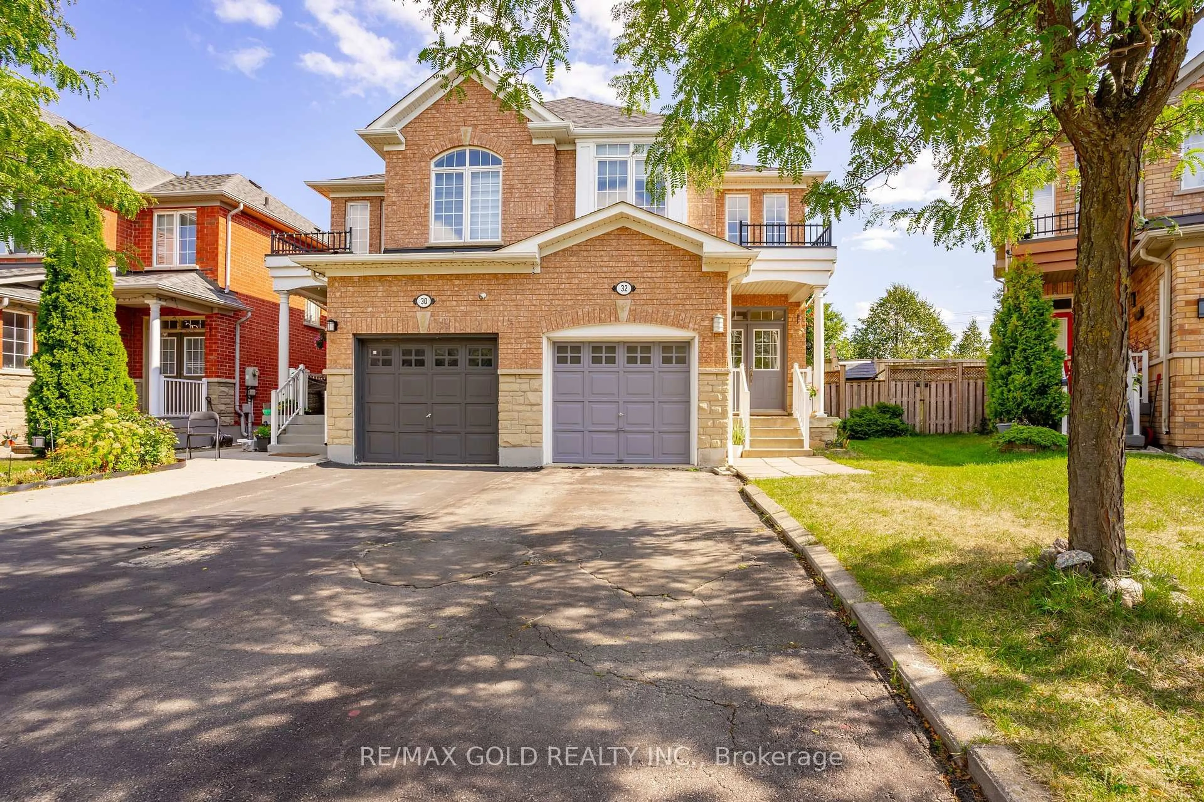 Home with brick exterior material, street for 32 Rubysilver Dr, Brampton Ontario L6P 1P9