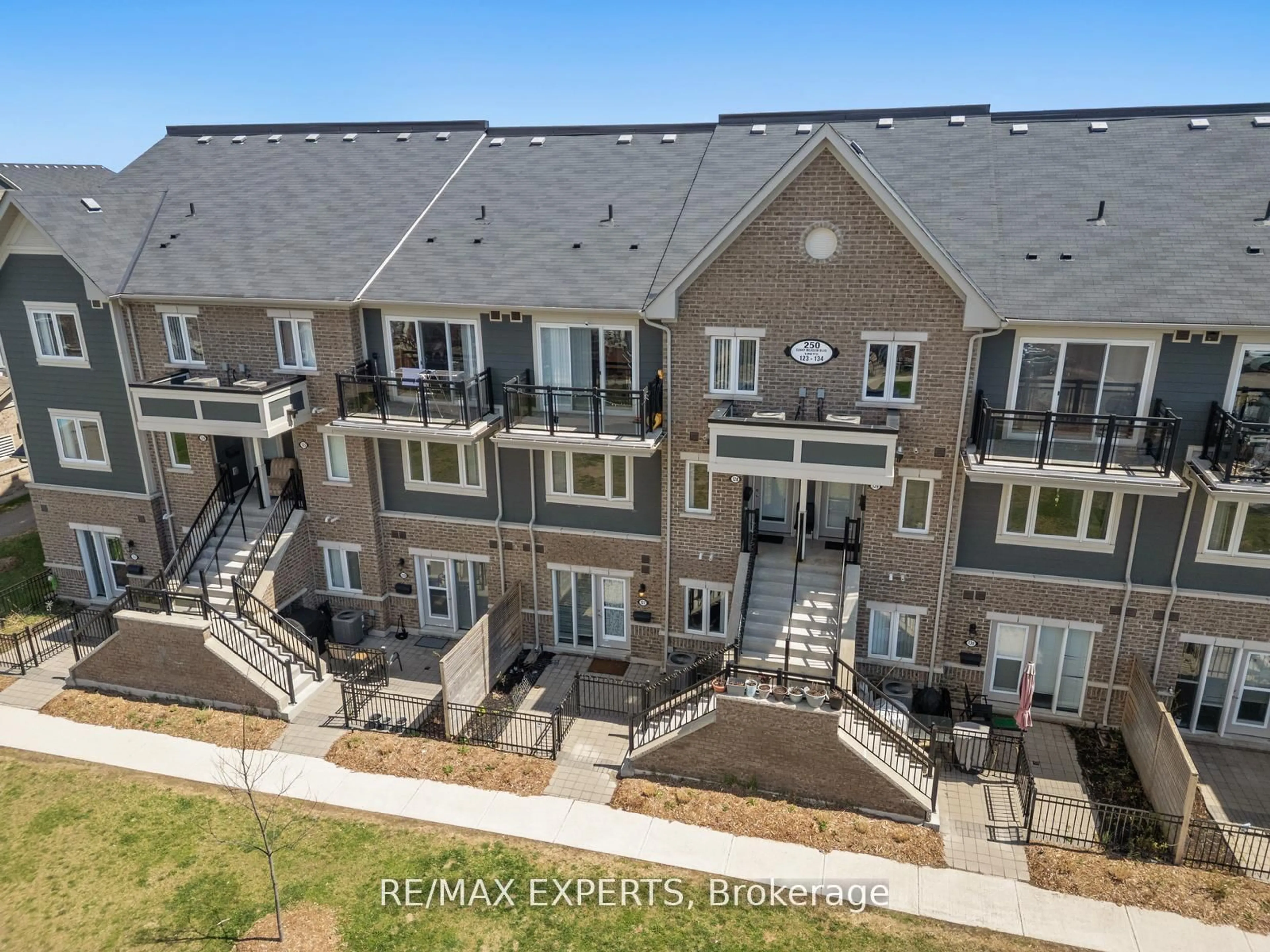 A pic from outside/outdoor area/front of a property/back of a property/a pic from drone, unknown for 250 Sunny Meadow Blvd #127, Brampton Ontario L6R 3Y6