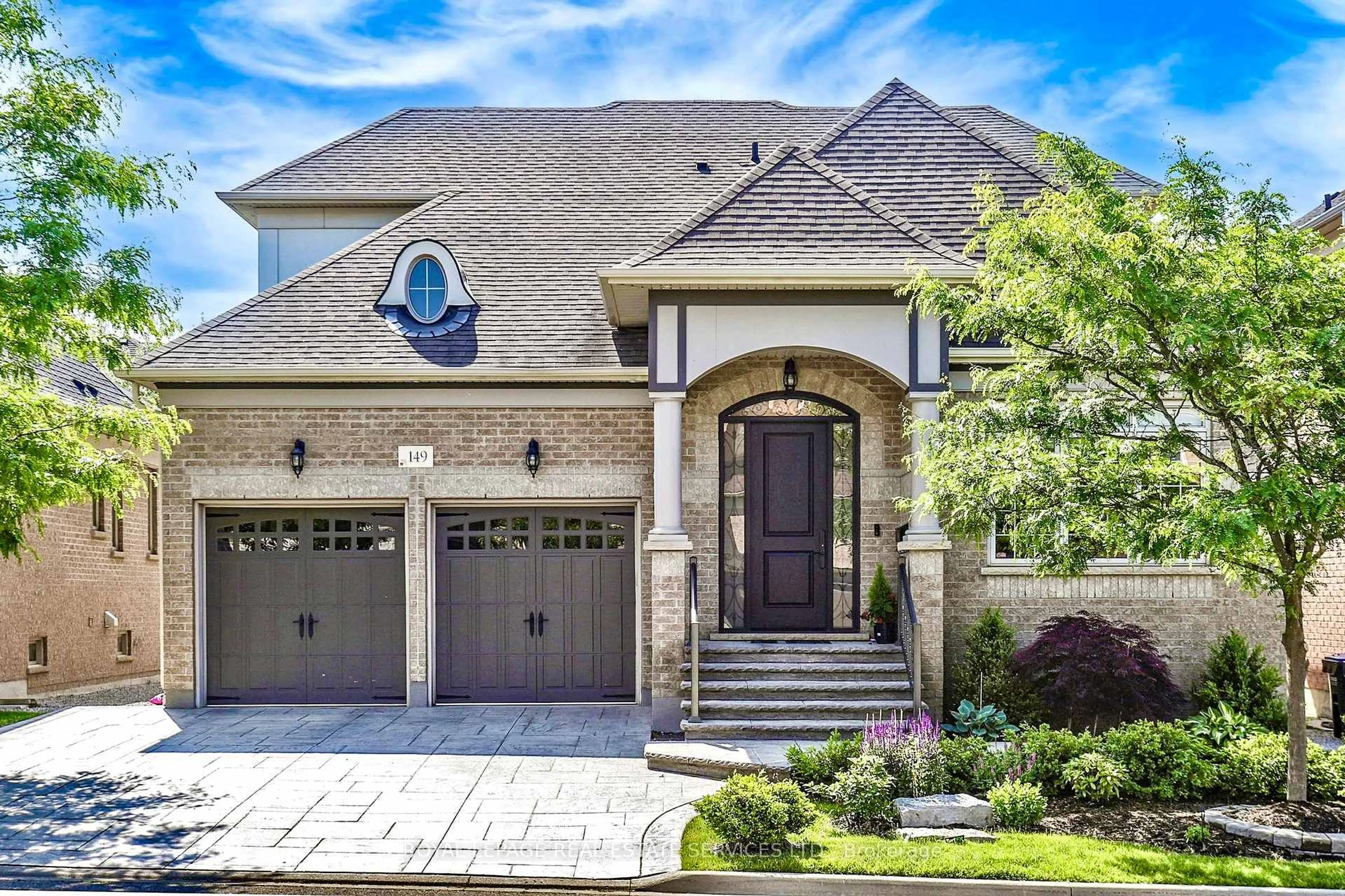 Home with brick exterior material, street for 149 Coastline Dr, Brampton Ontario L6Y 0L7