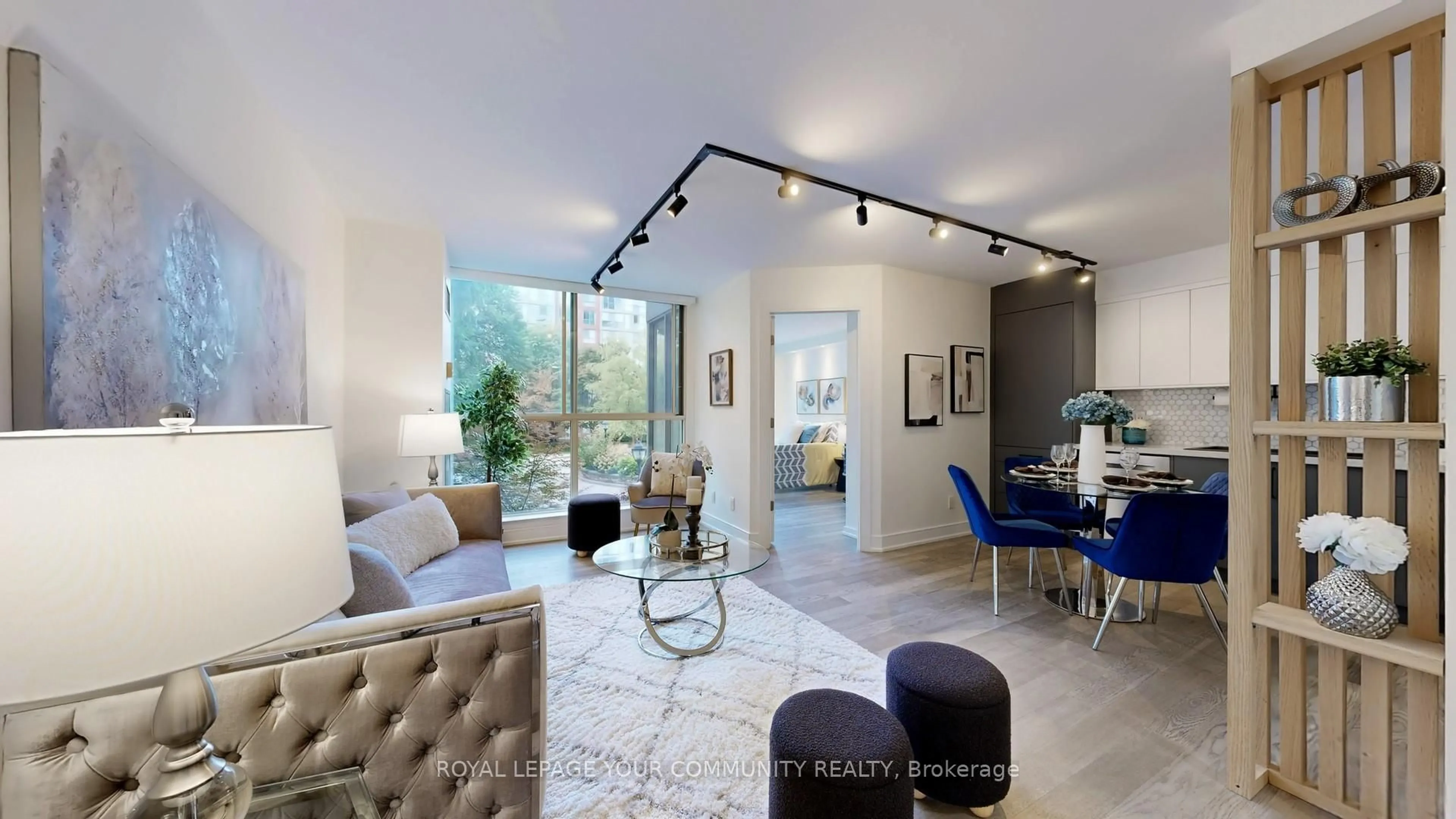 Living room with furniture, ceramic/tile floor for 22 Southport St #233, Toronto Ontario M6S 4Y9