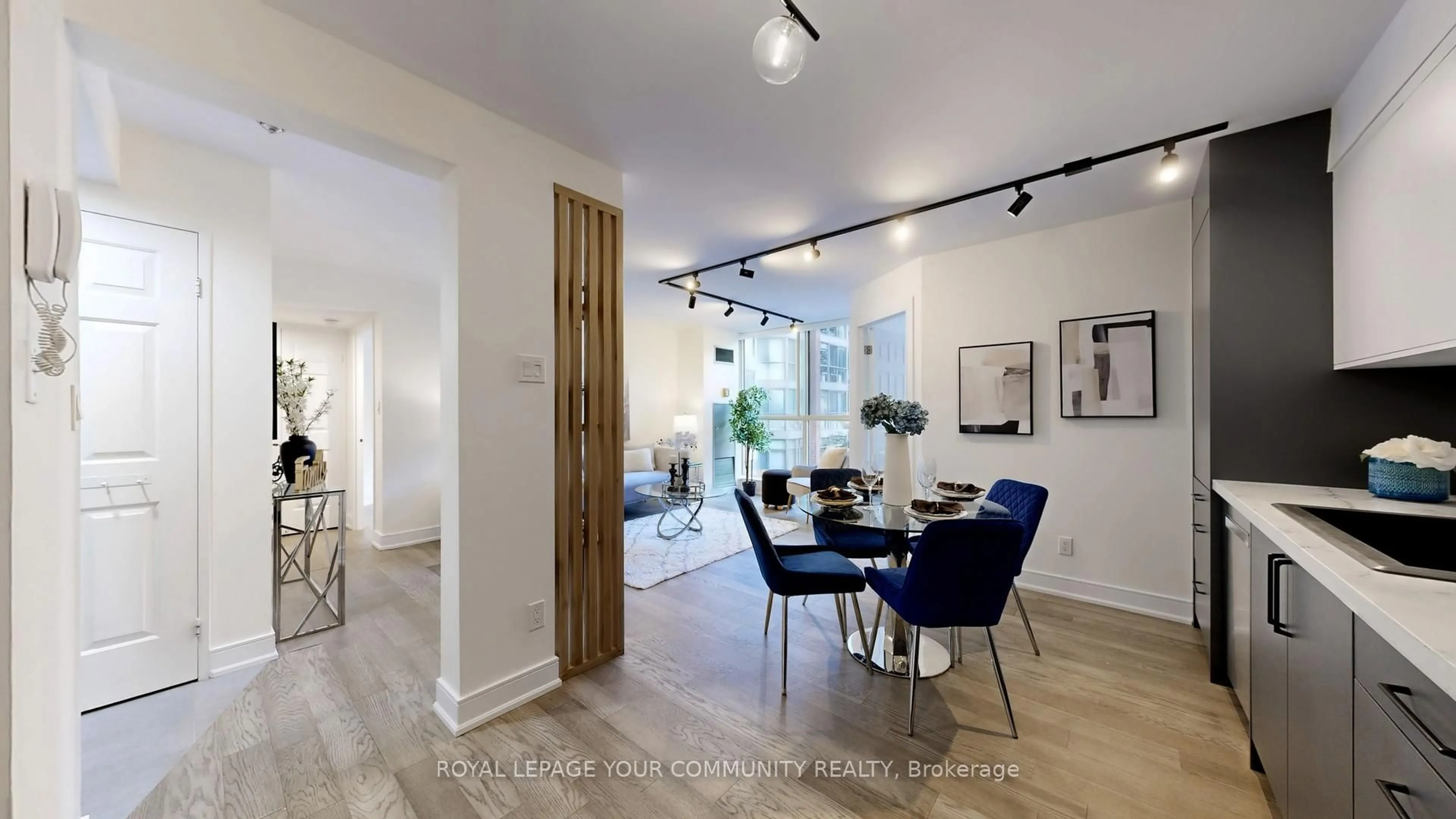 Dining room, wood/laminate floor for 22 Southport St #233, Toronto Ontario M6S 4Y9