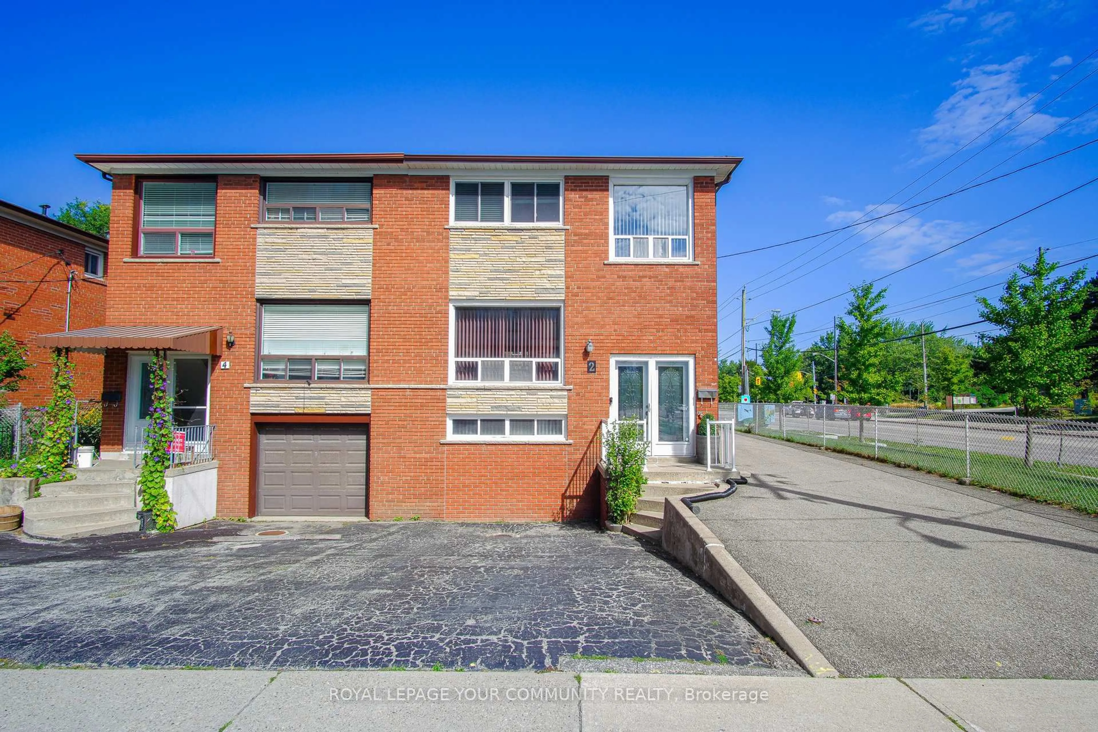 Home with brick exterior material, street for 2 Maryport Ave, Toronto Ontario M3M 2V9