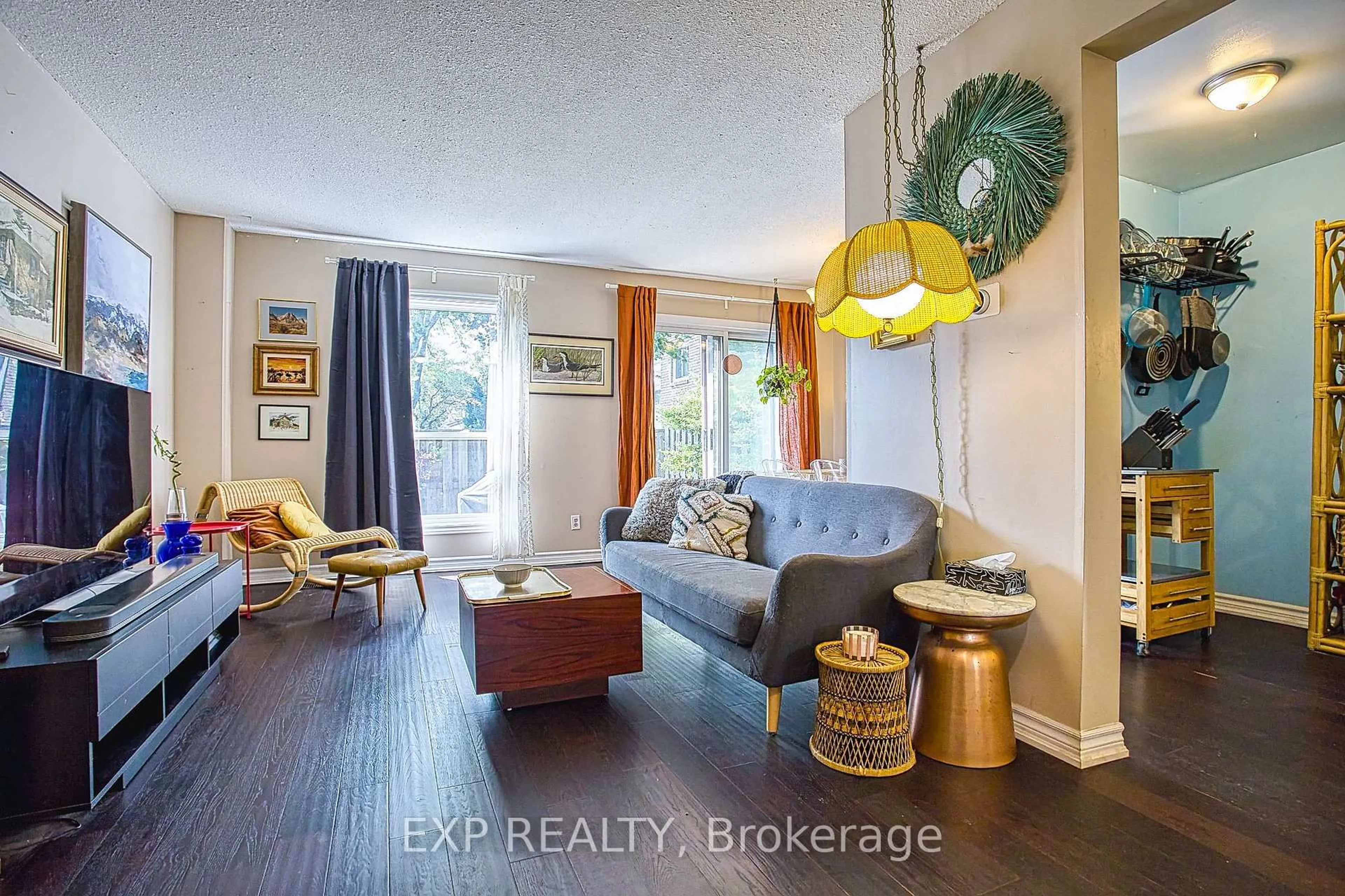 Living room with furniture, wood/laminate floor for 680 Regency Crt #84, Burlington Ontario L7N 3L9